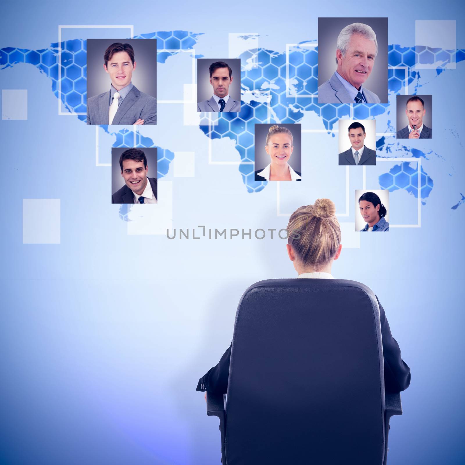 Composite image of businesswoman sitting on swivel chair by Wavebreakmedia