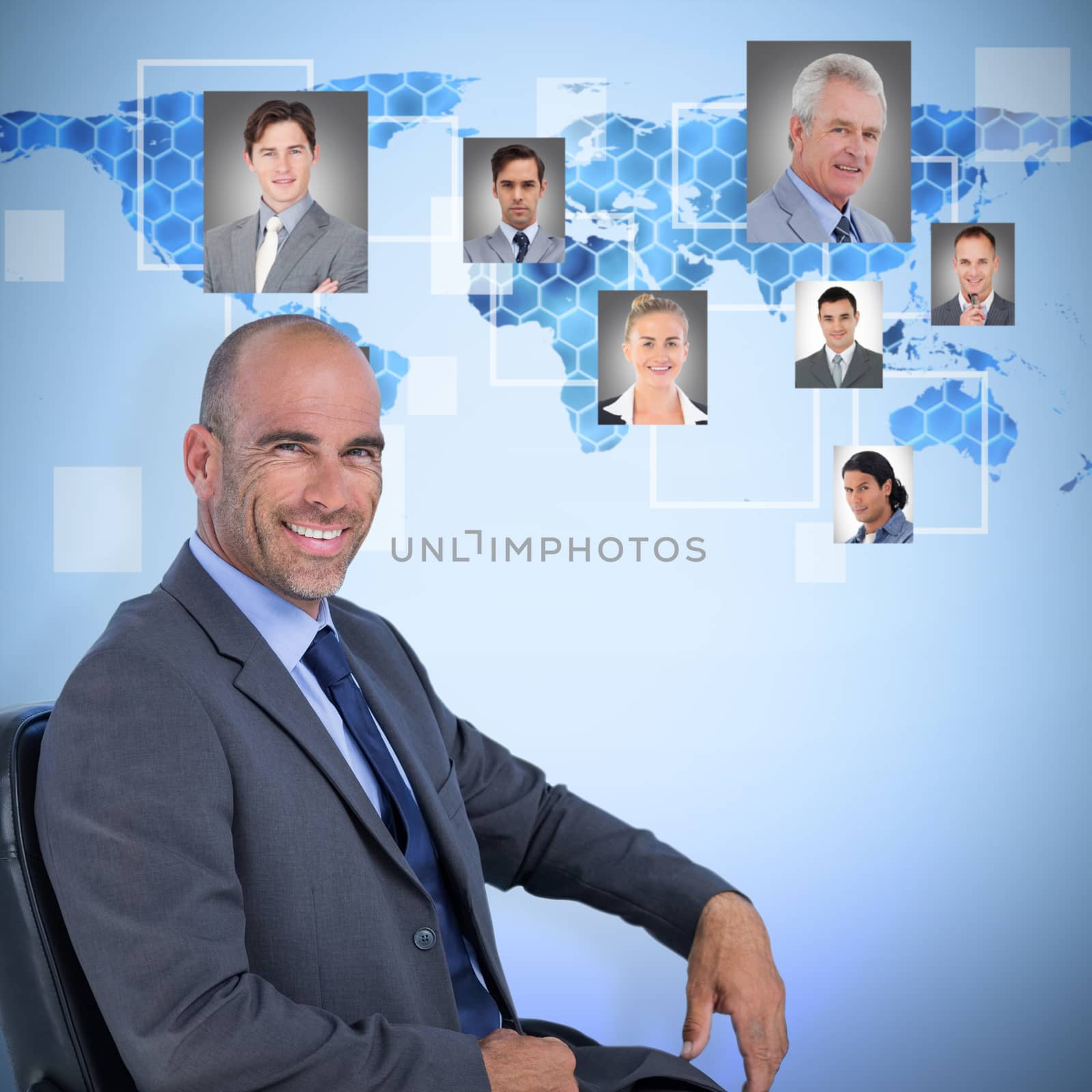 Composite image of portrait of confident businessman sitting on chair by Wavebreakmedia