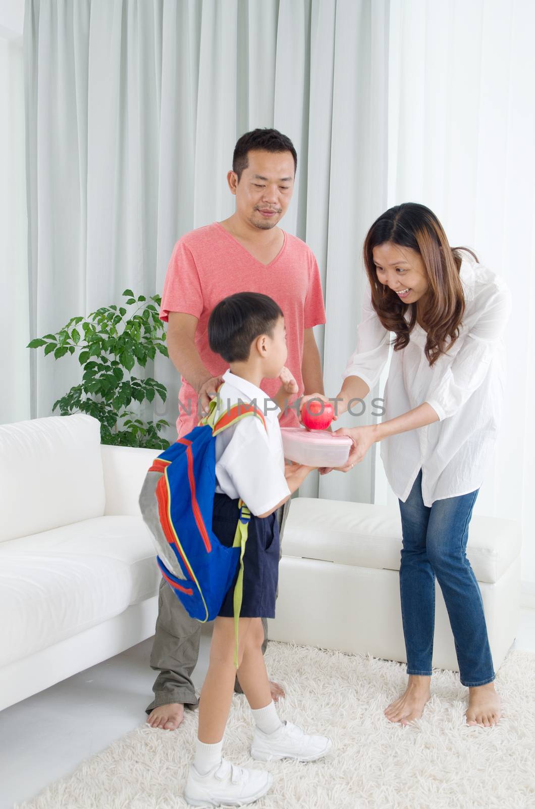 Asian parents get their children ready to school