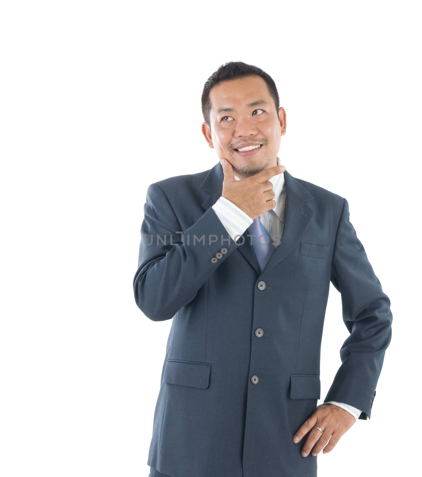 Mature Indonesian businessman smiling, isolated white background