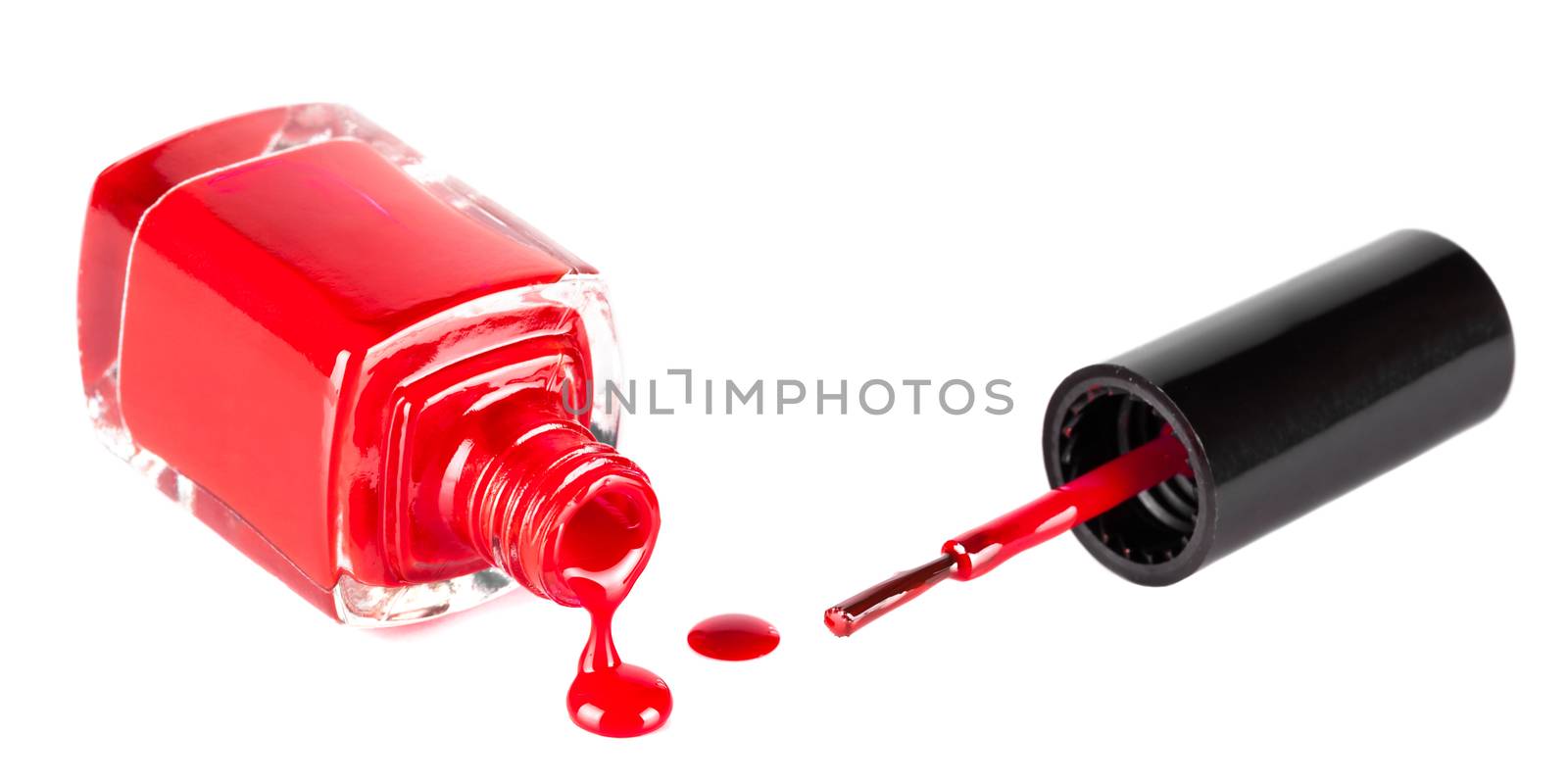 red nail polish closeup on white background