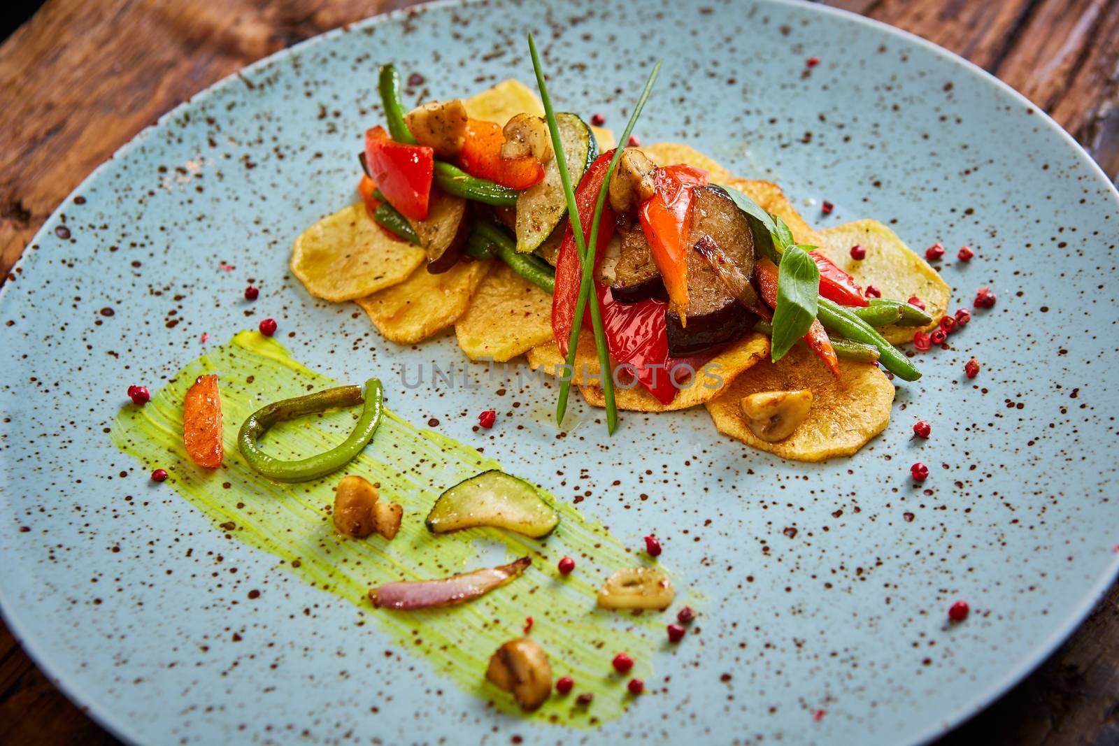 Potato Chips with sweet pepper, aubergine and asparagus. Healthy  food, vegan or diet nutrition concept.