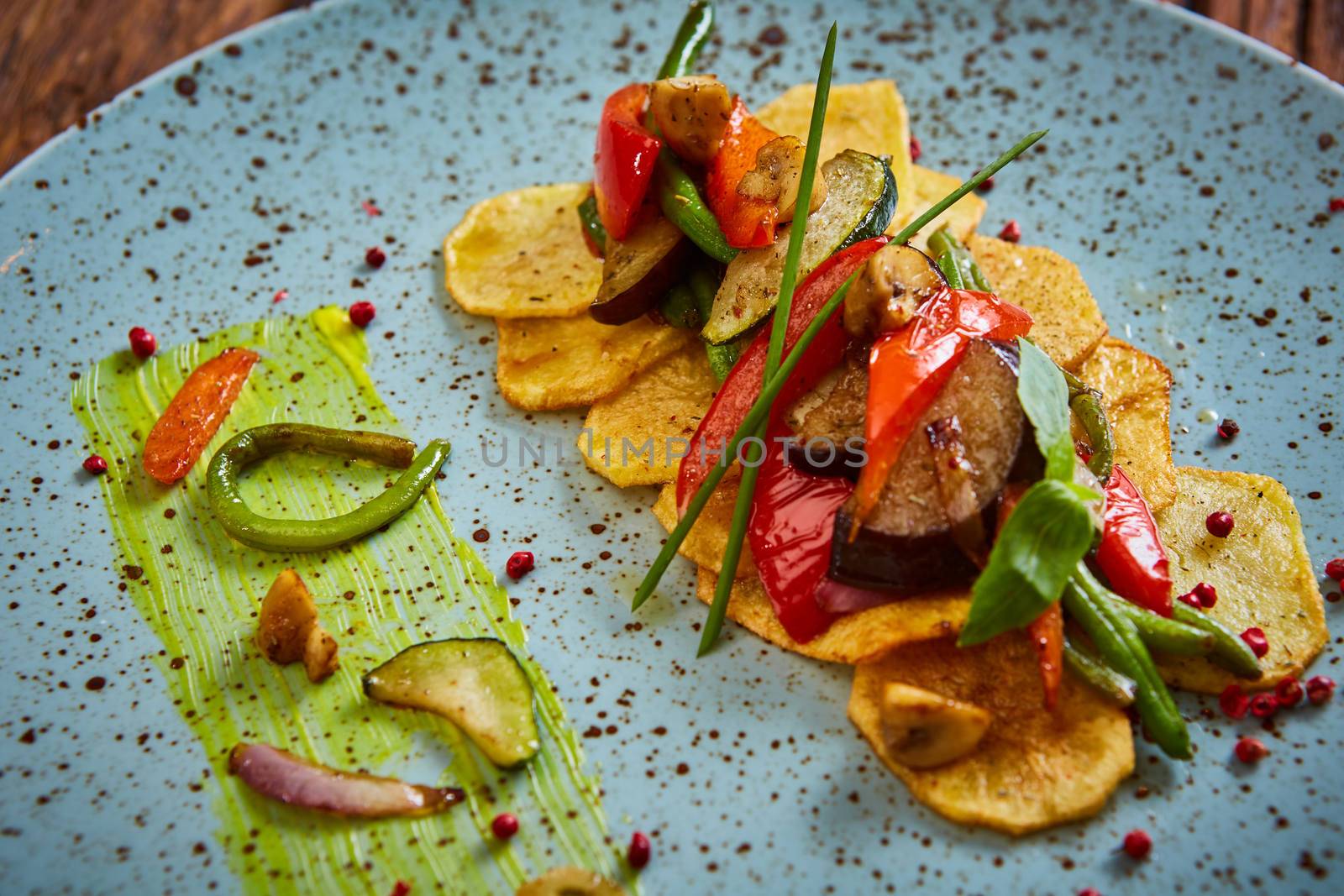 Potato Chips with sweet pepper, aubergine and asparagus. Healthy  food, vegan or diet nutrition concept.