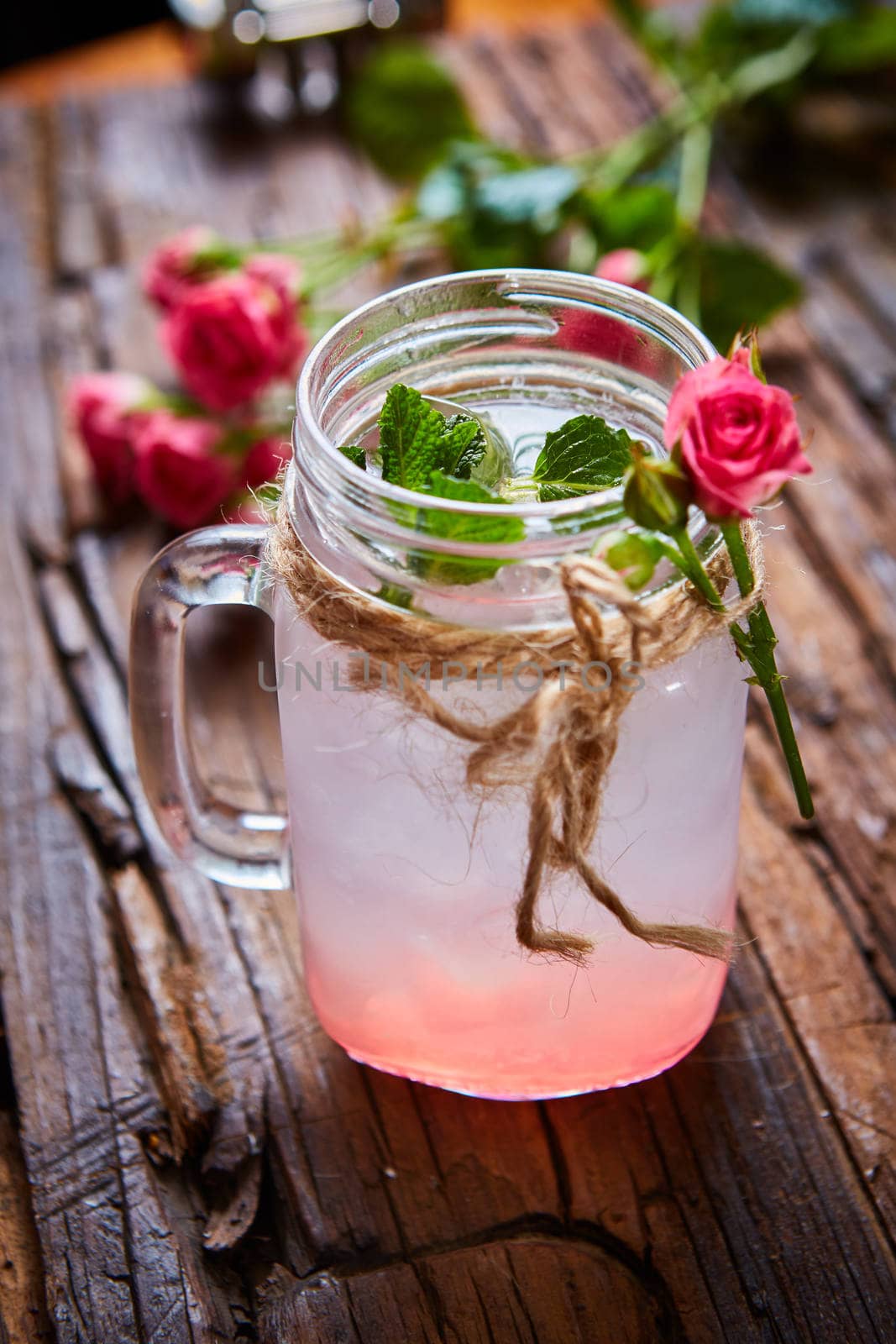 fresh mojito on a rustic table. Shallow dof