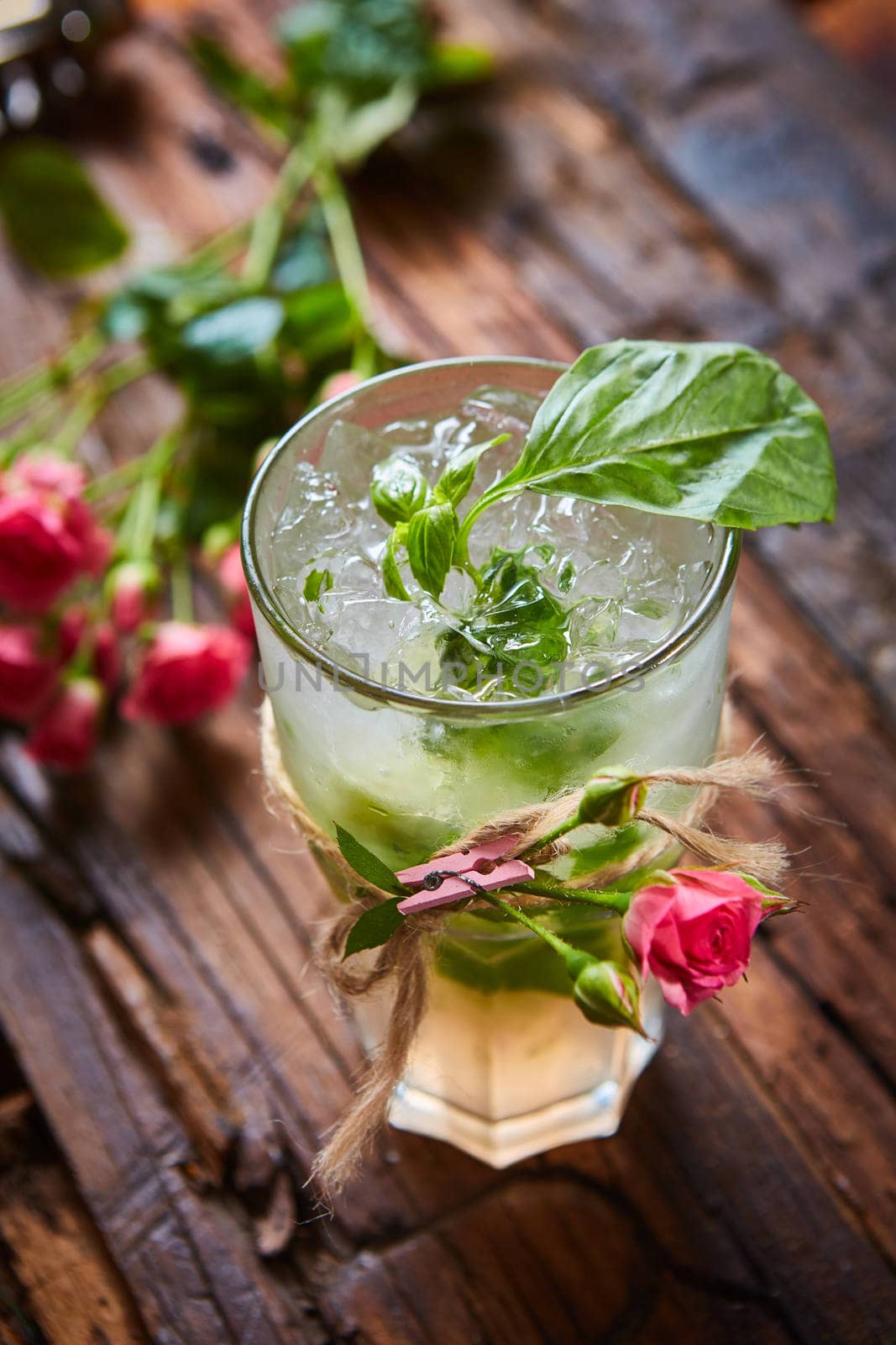 fresh mojito on a rustic table. Shallow dof