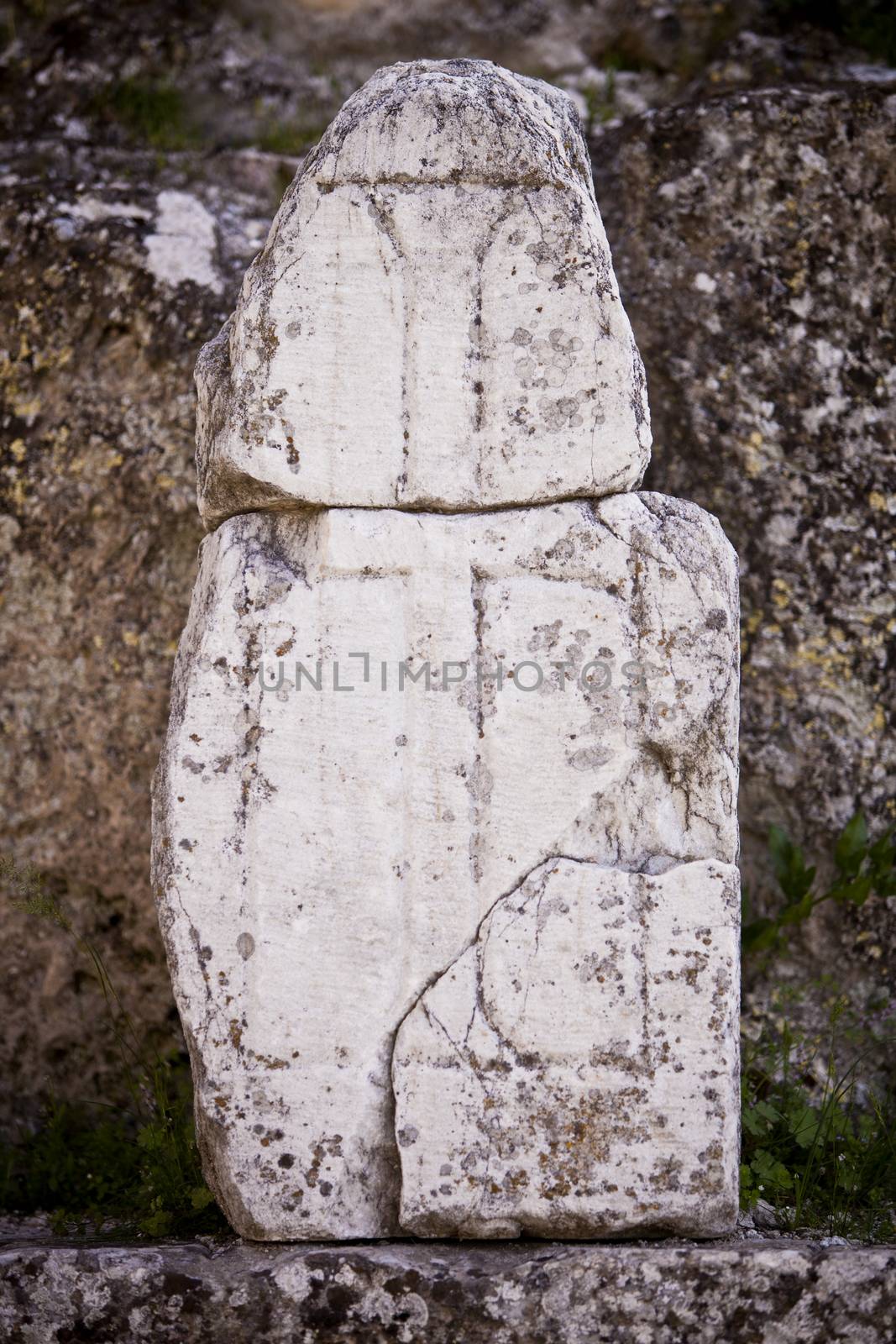 Cross carved in stone at the ruins of Laodicea