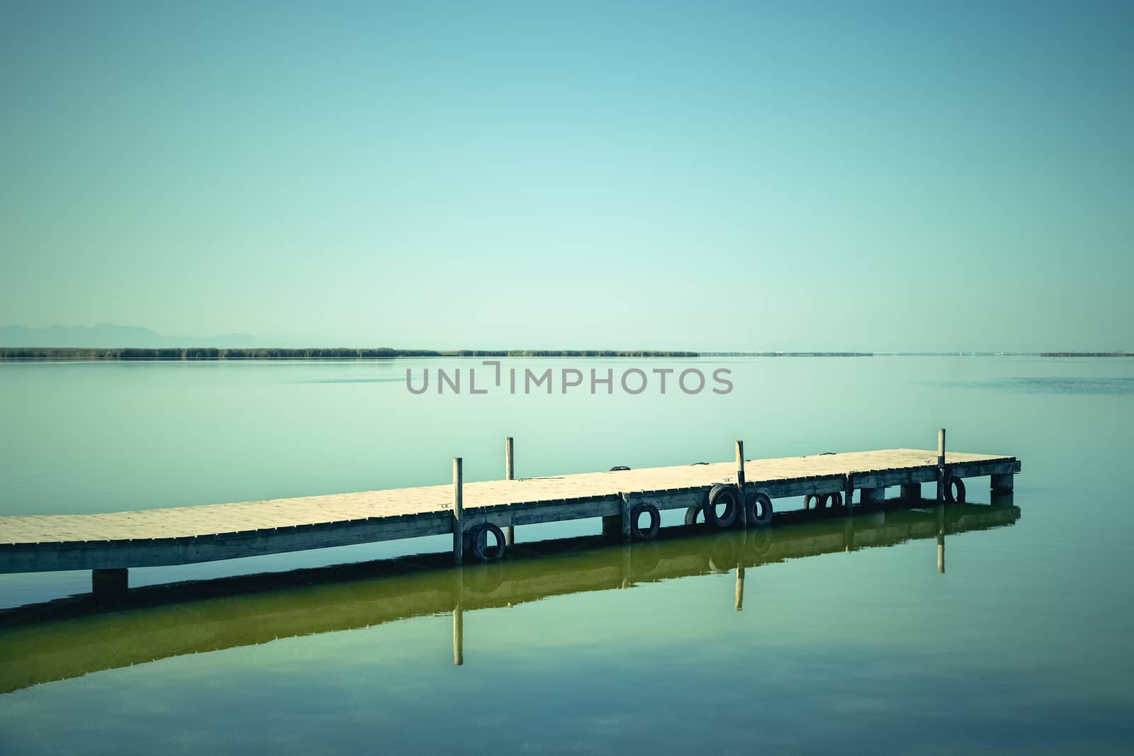 Calm water of the Albufera lagoon. Natural park in Valencian Community, Spain.