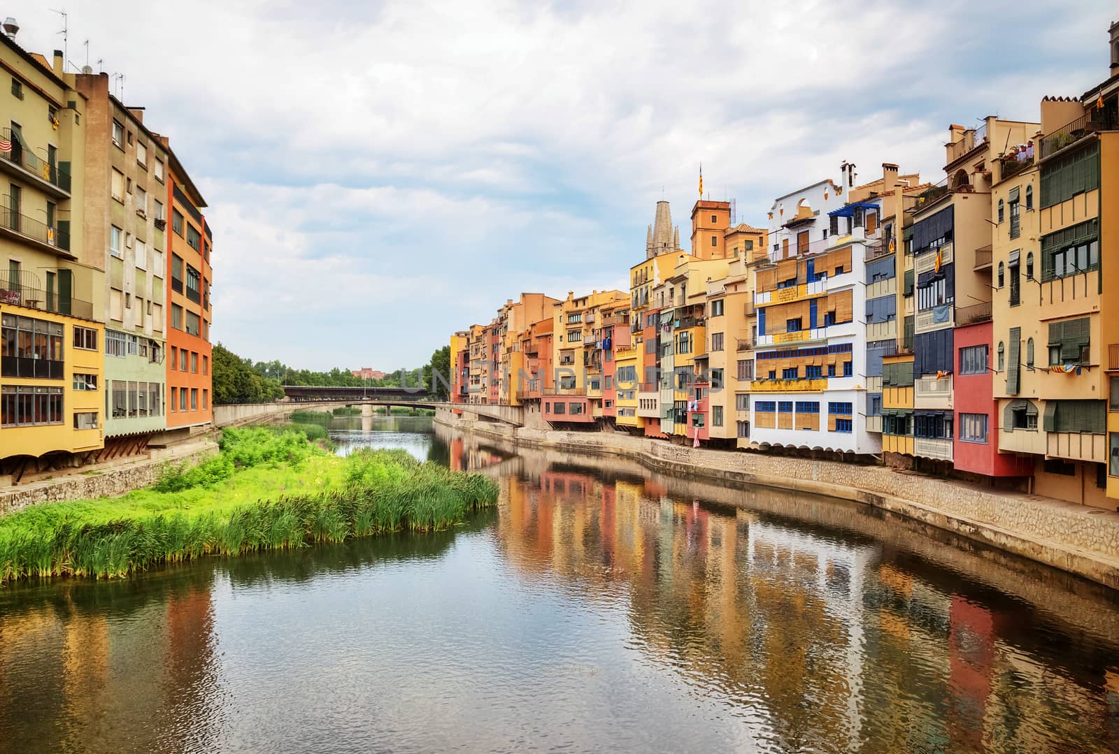 River and picturesque buildings of Girona, Catalonia by anikasalsera