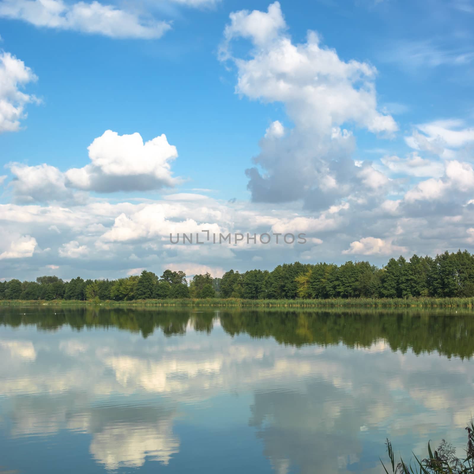 blue lake with cloudy sky, nature series