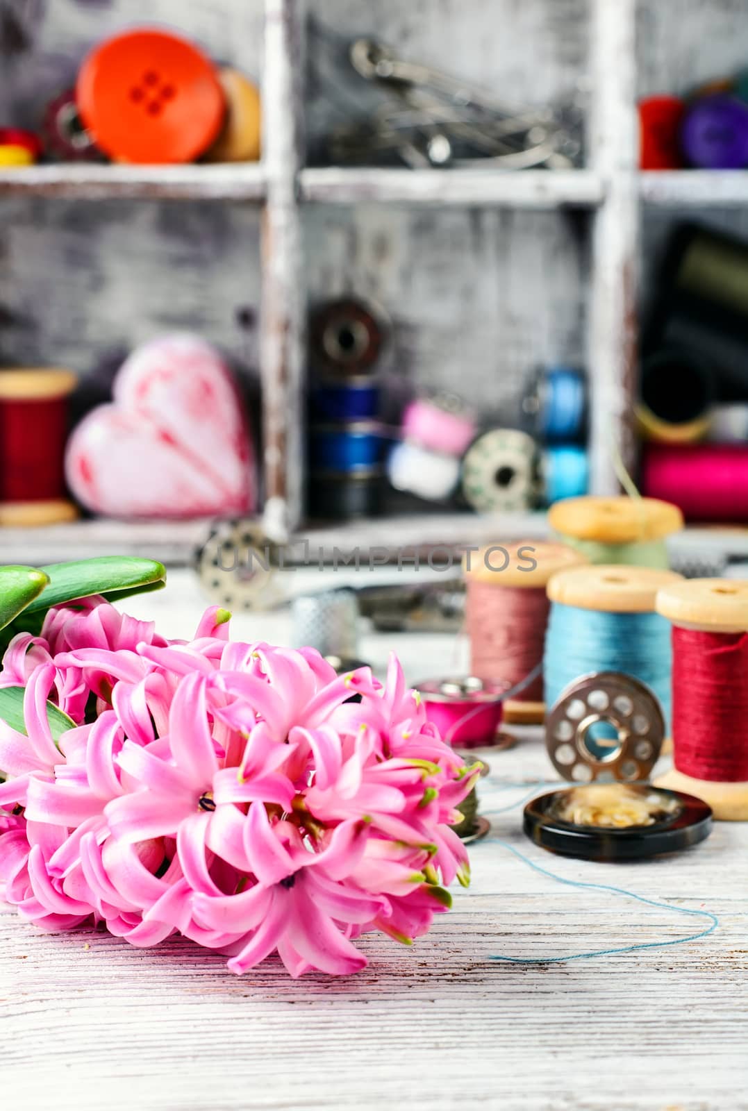 Pink hyacinth and tools for making jewelry for spring