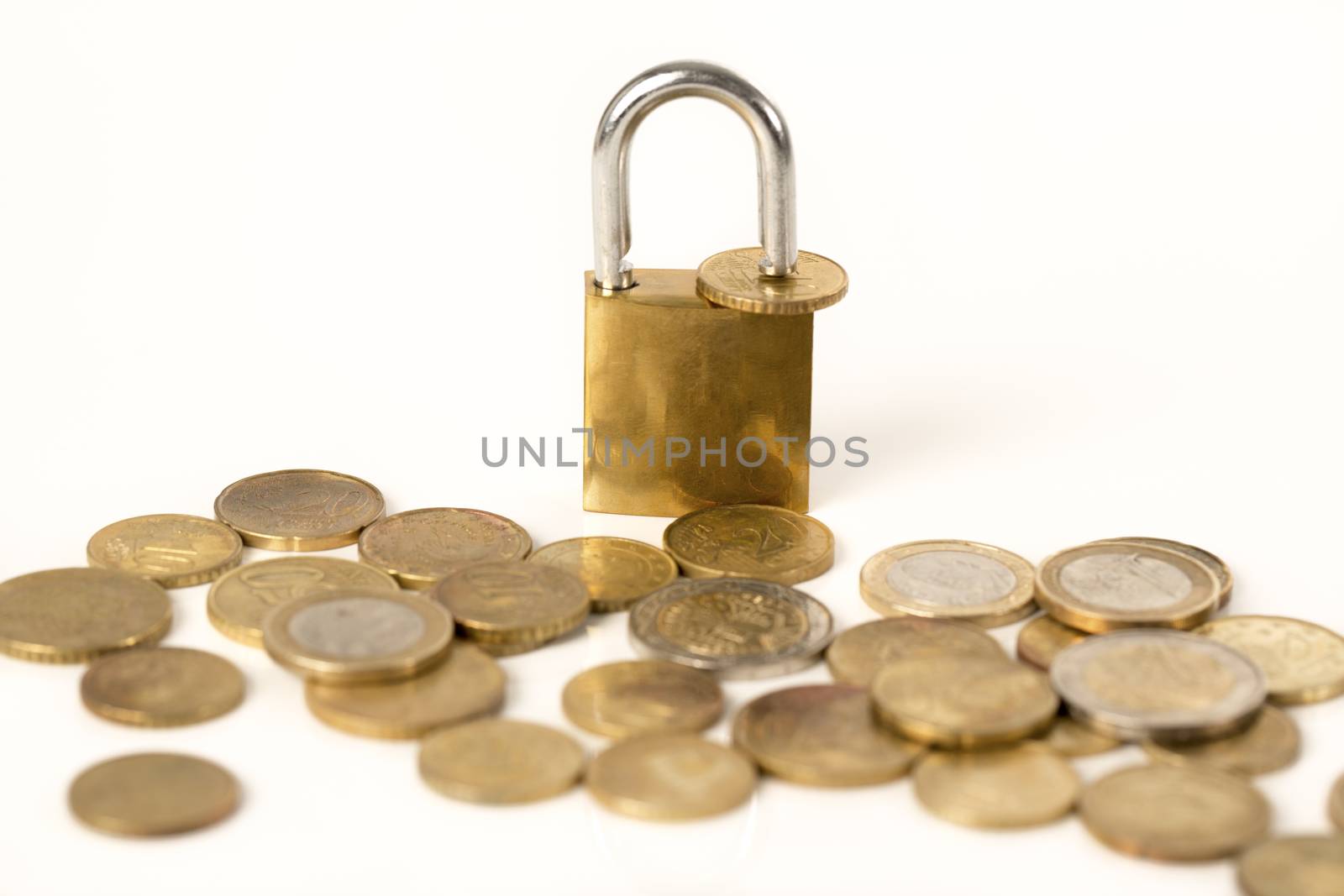 Credit card payment concept : Golden credit card with coins in white background.