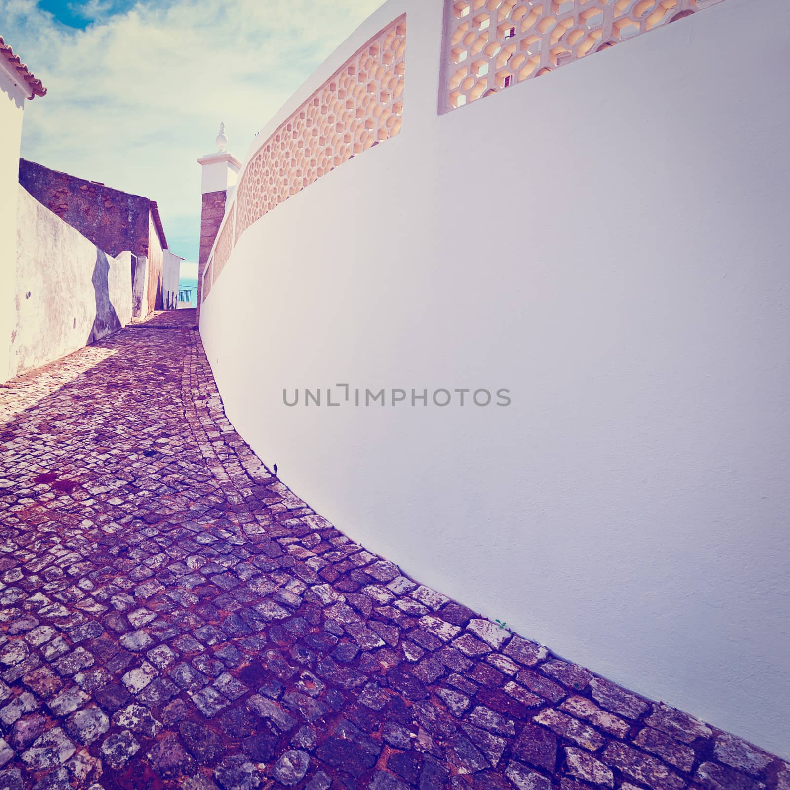 Narrow Street in the Medieval Portuguese City of Albufeira, Vintage Style Toned Picture