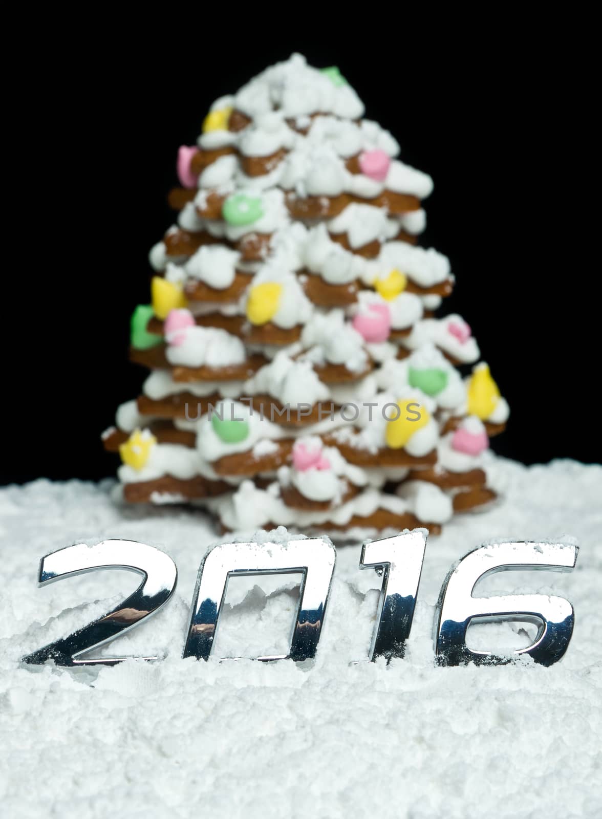 Number 2016 and gingerbread Christmas tree for New Year 2016.