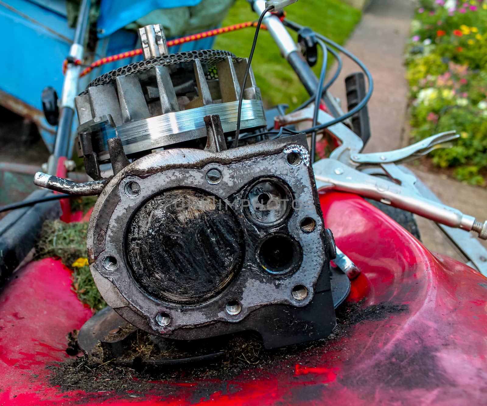 Lawnmower being fixed and showing internal workings