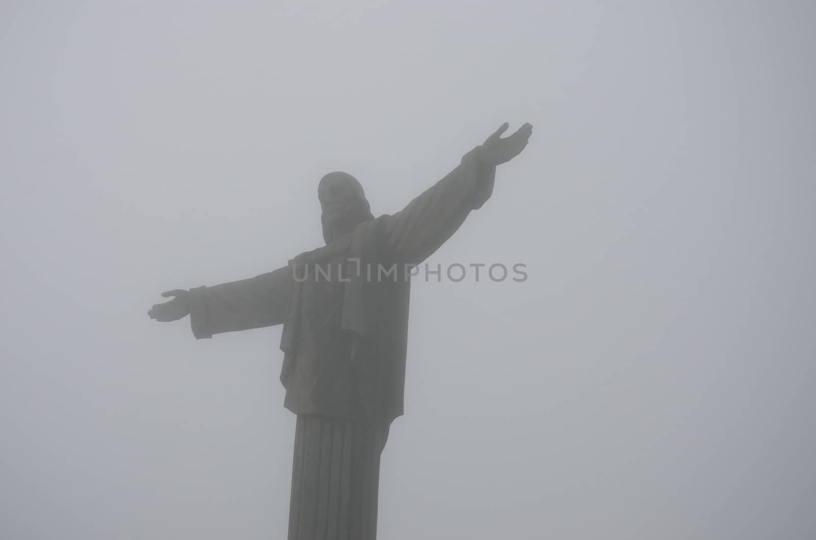 Statue of Christ in the mist