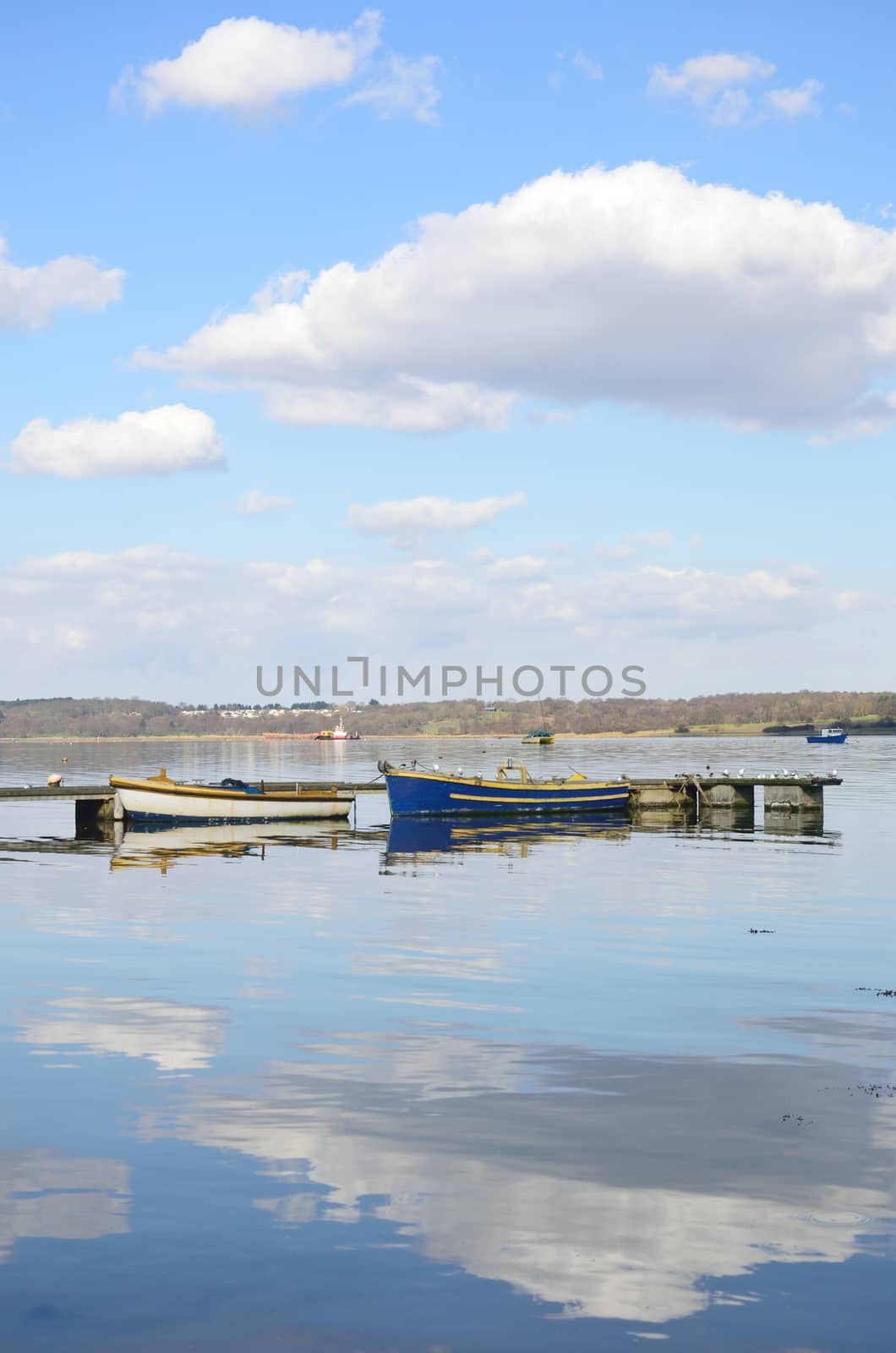 Boats moored in Estuary Suffolk by pauws99