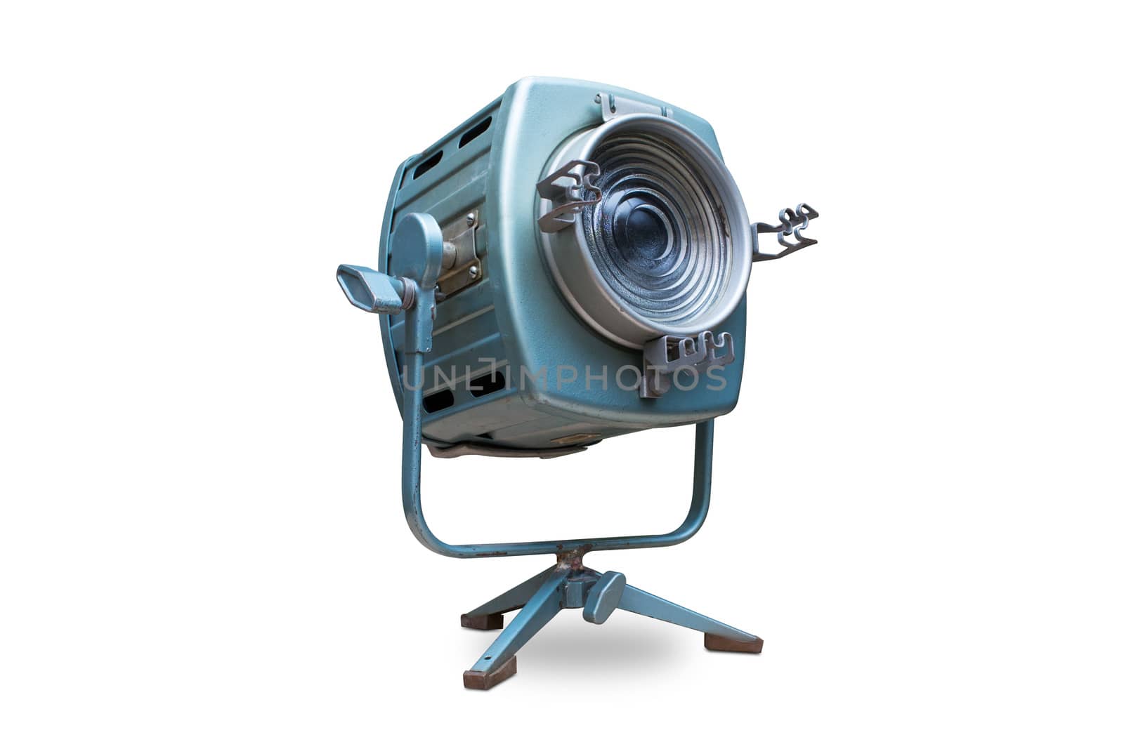 Studio spotlight lighting equipment with stand. Electrical source of constant light, cyan color, used with traces of use and rust, halogen bulb. Isolated on white background, clipping path included.