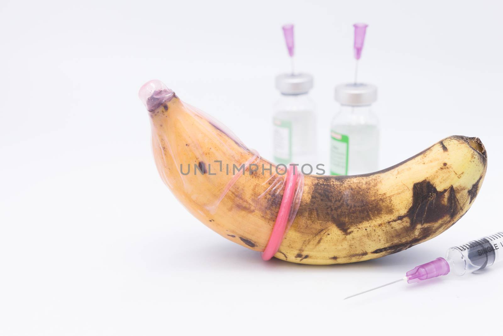 rotten banana in condom,sexually transmitted disease concept by frank600