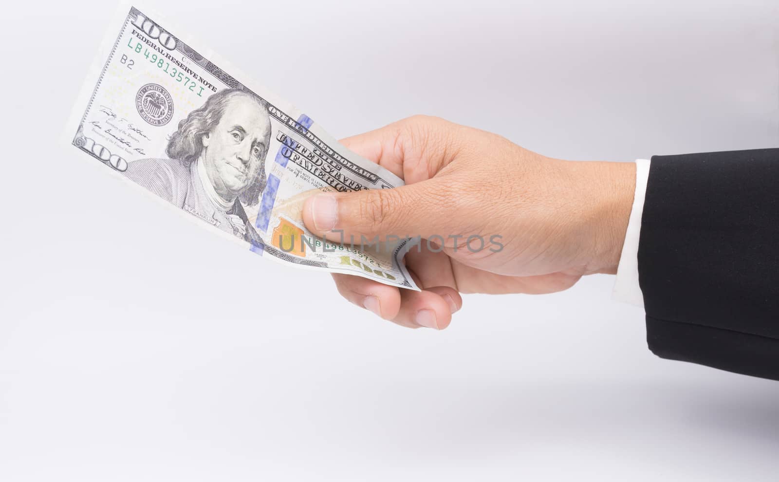 US dollars in business hand isolated on a white background by frank600