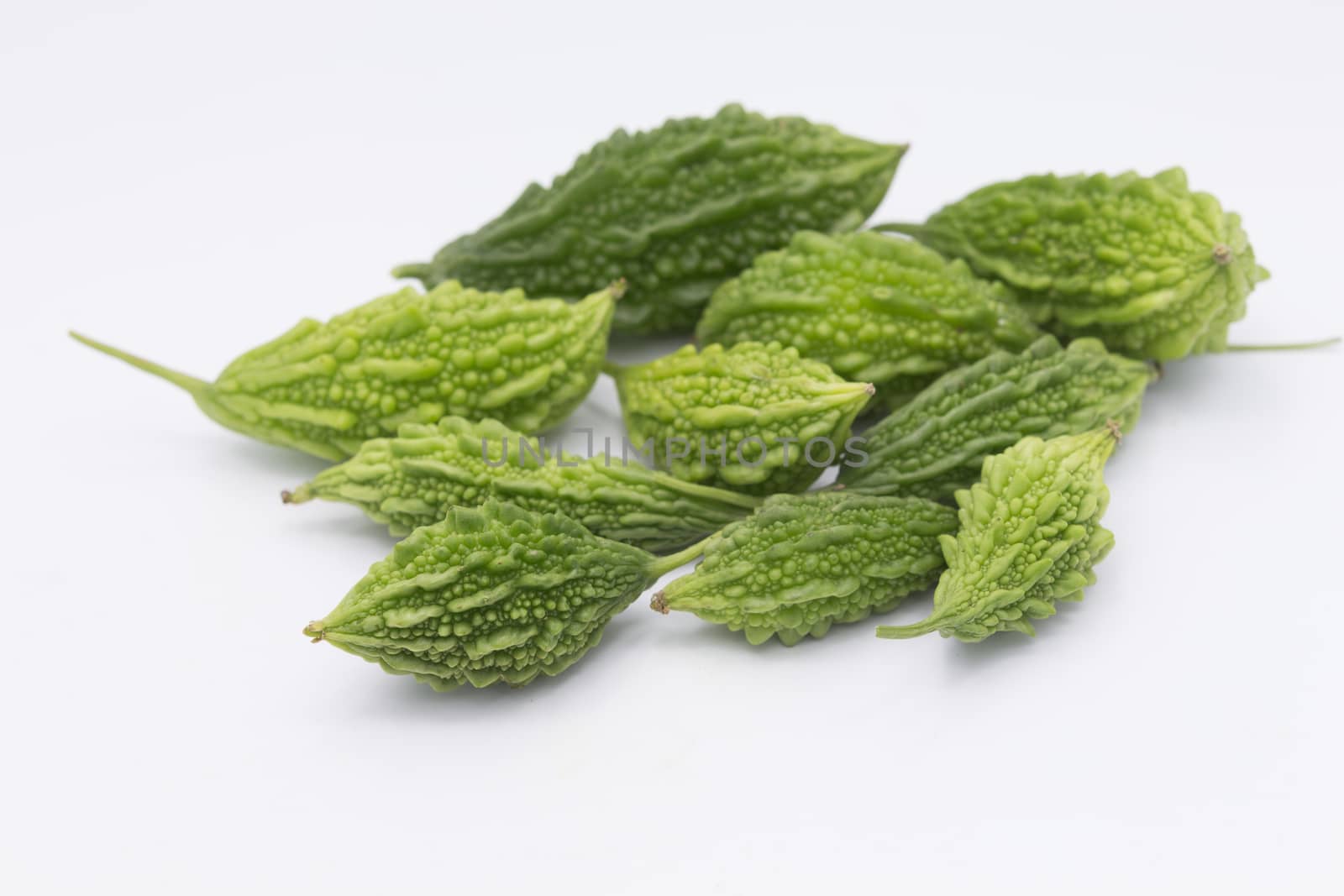 Green Momordica or karela with leaf isolate on white bacground