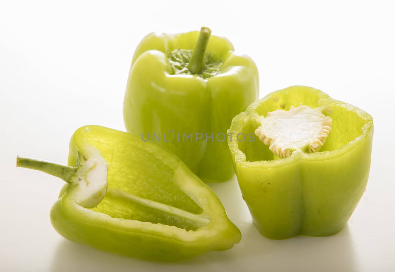 green pepper on white background