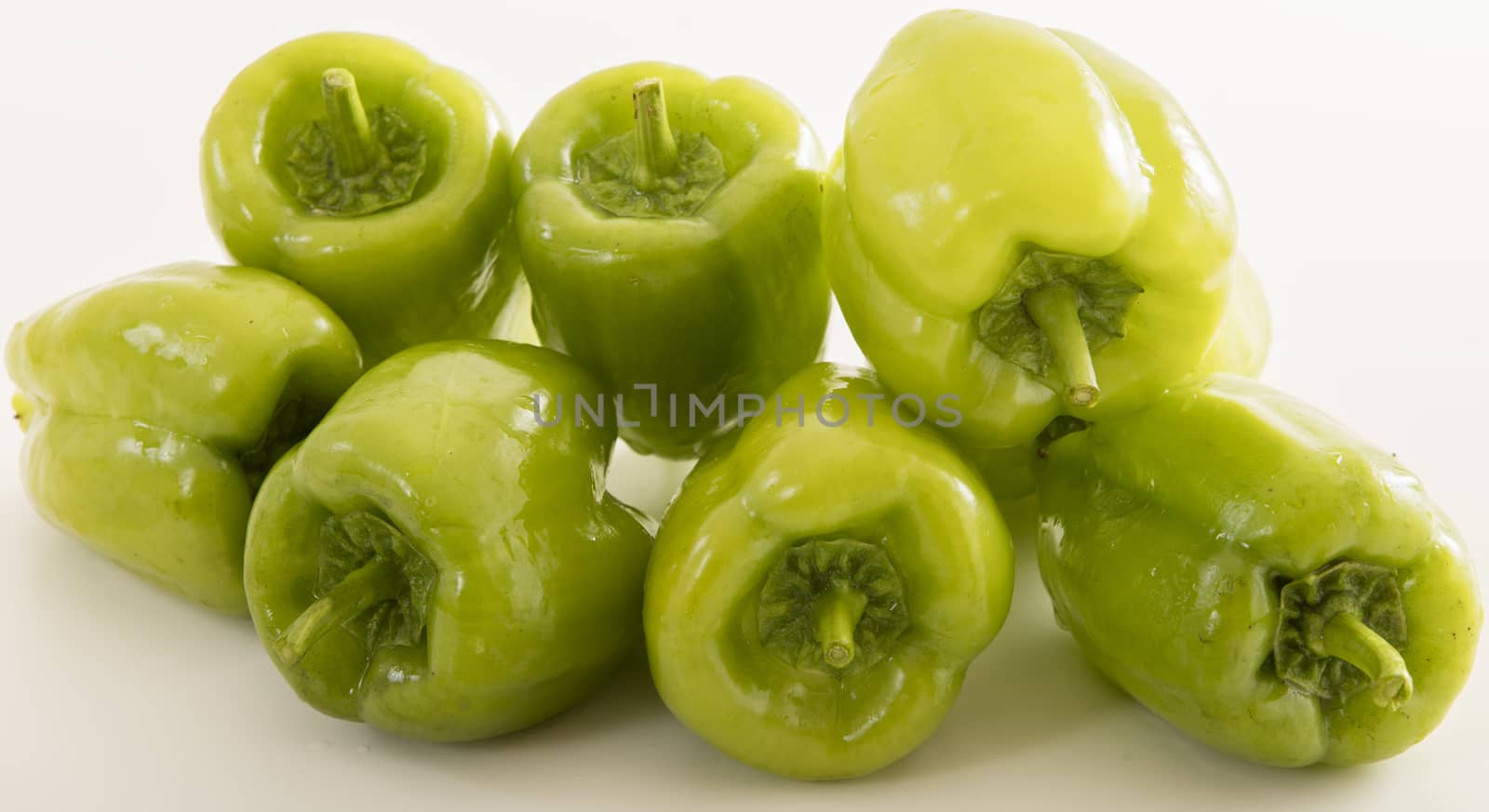 green pepper on white background