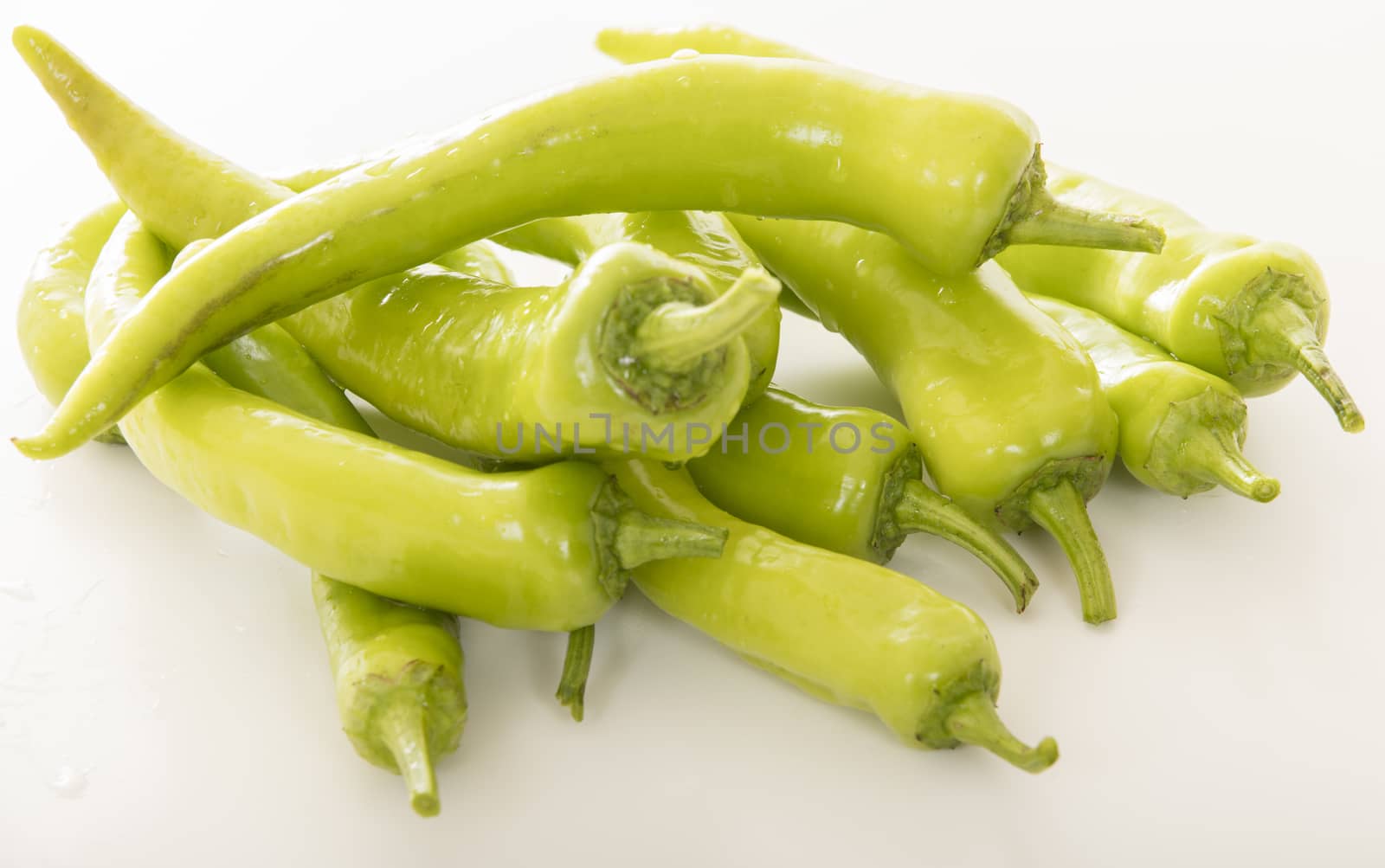 green pepper on white background