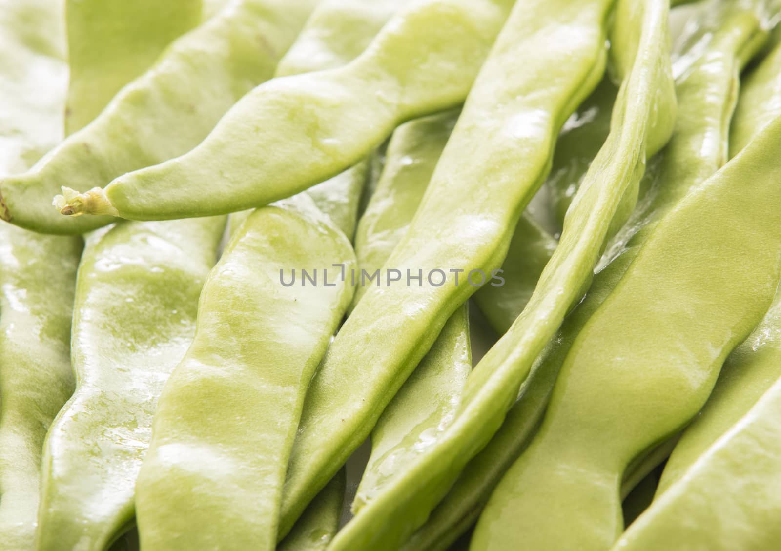 green beans on white background