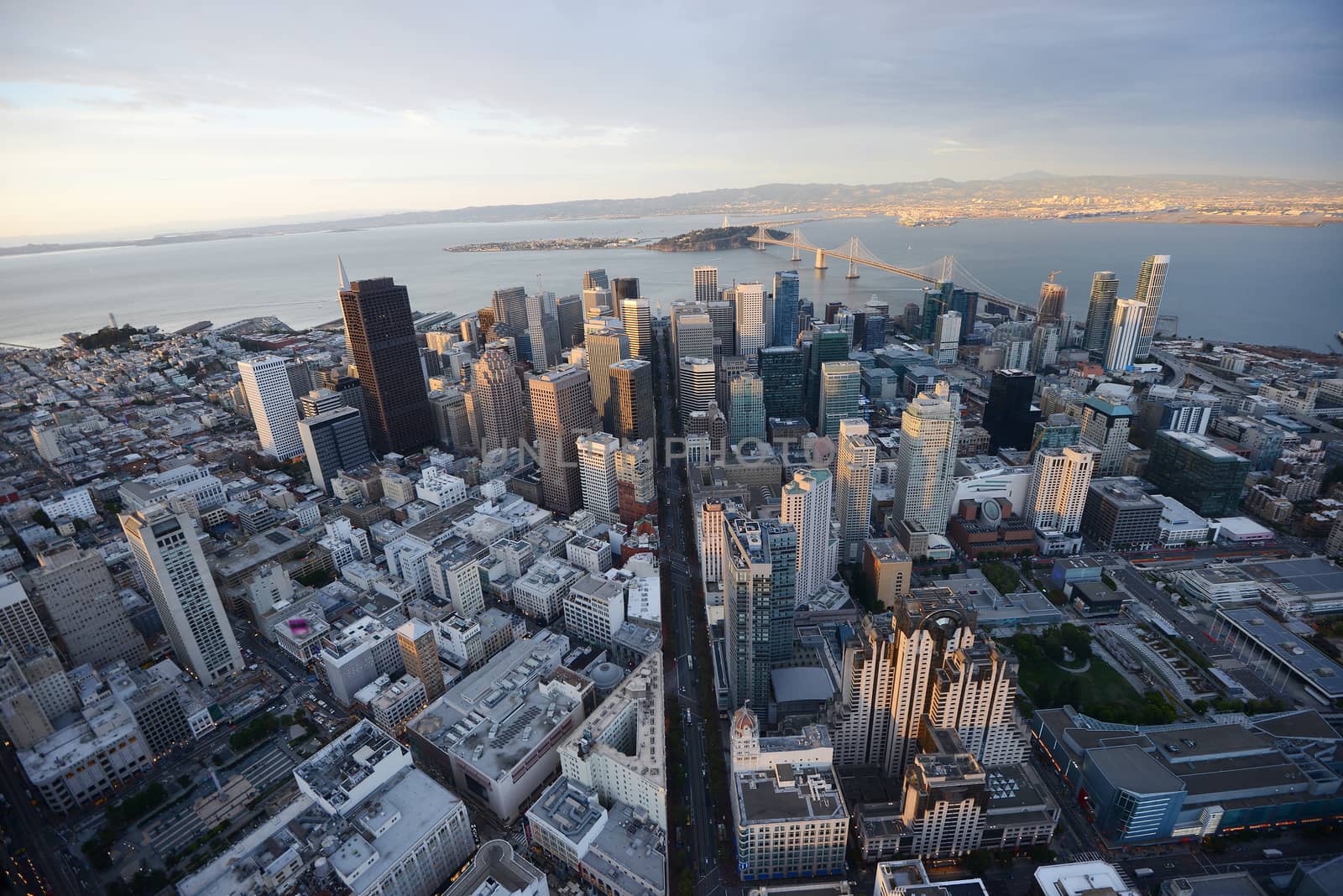 an aerial view of downtown san francisco during sunset