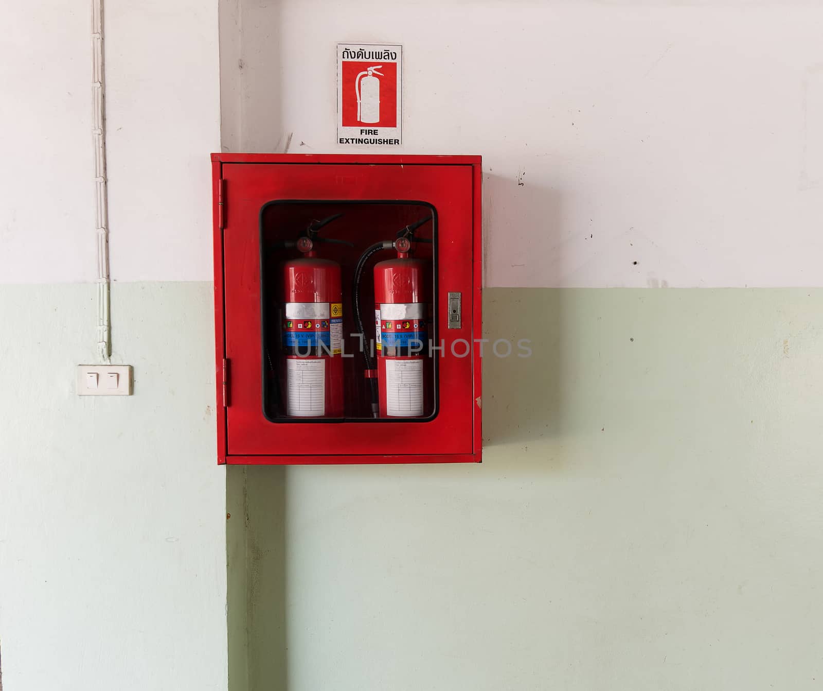 fire extinguishing equipment install on the wall by suthee