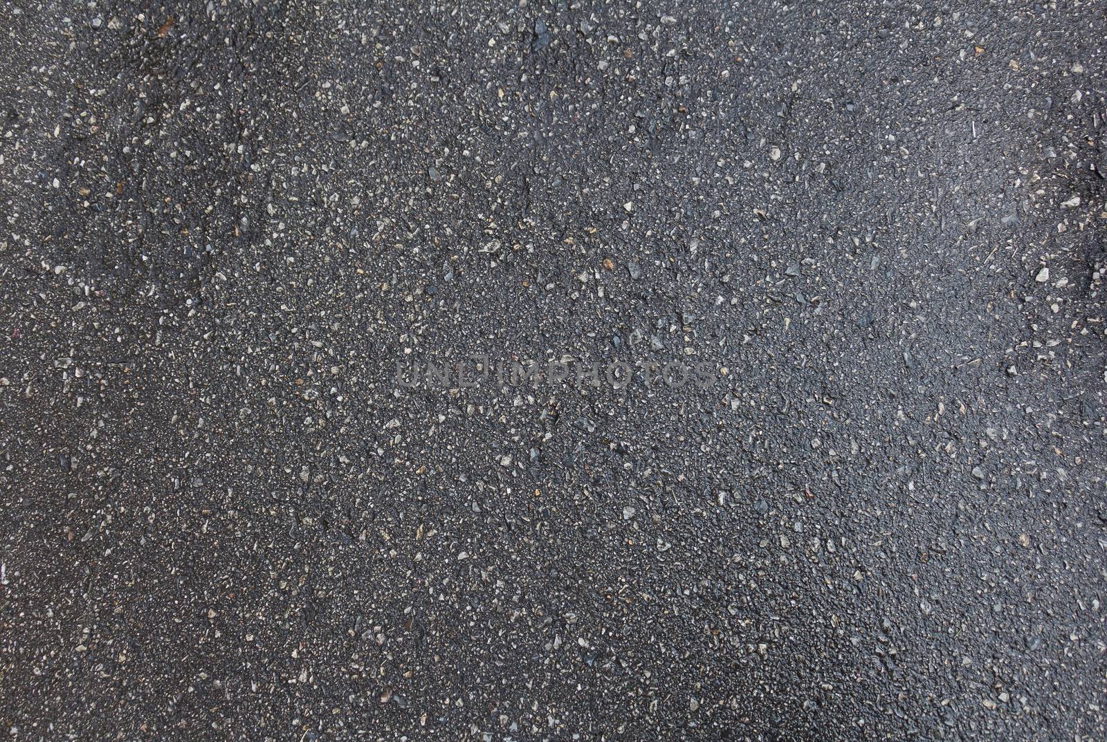 Wet black dirty asphalt road texture background