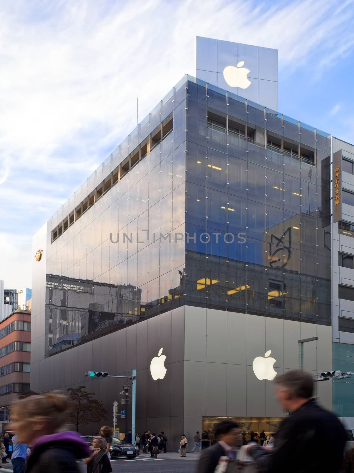 Ginza, Tokyo, Japan - November 12, 2015: The first dedicated Apple store outside the US caused quite a stir when it opened on the main street of Ginza district in 2003. It bustles with excited customers whenever a brand-new iPhone, iPod or MacBook is released.
