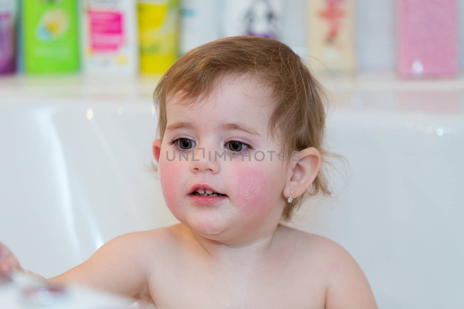 little girl taking spa bath by artush