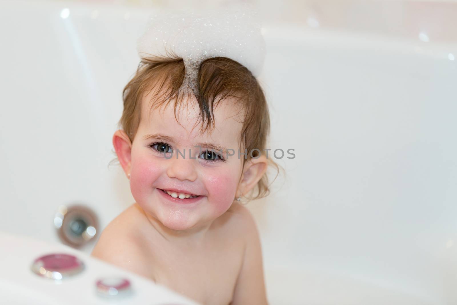 little girl taking spa bath by artush