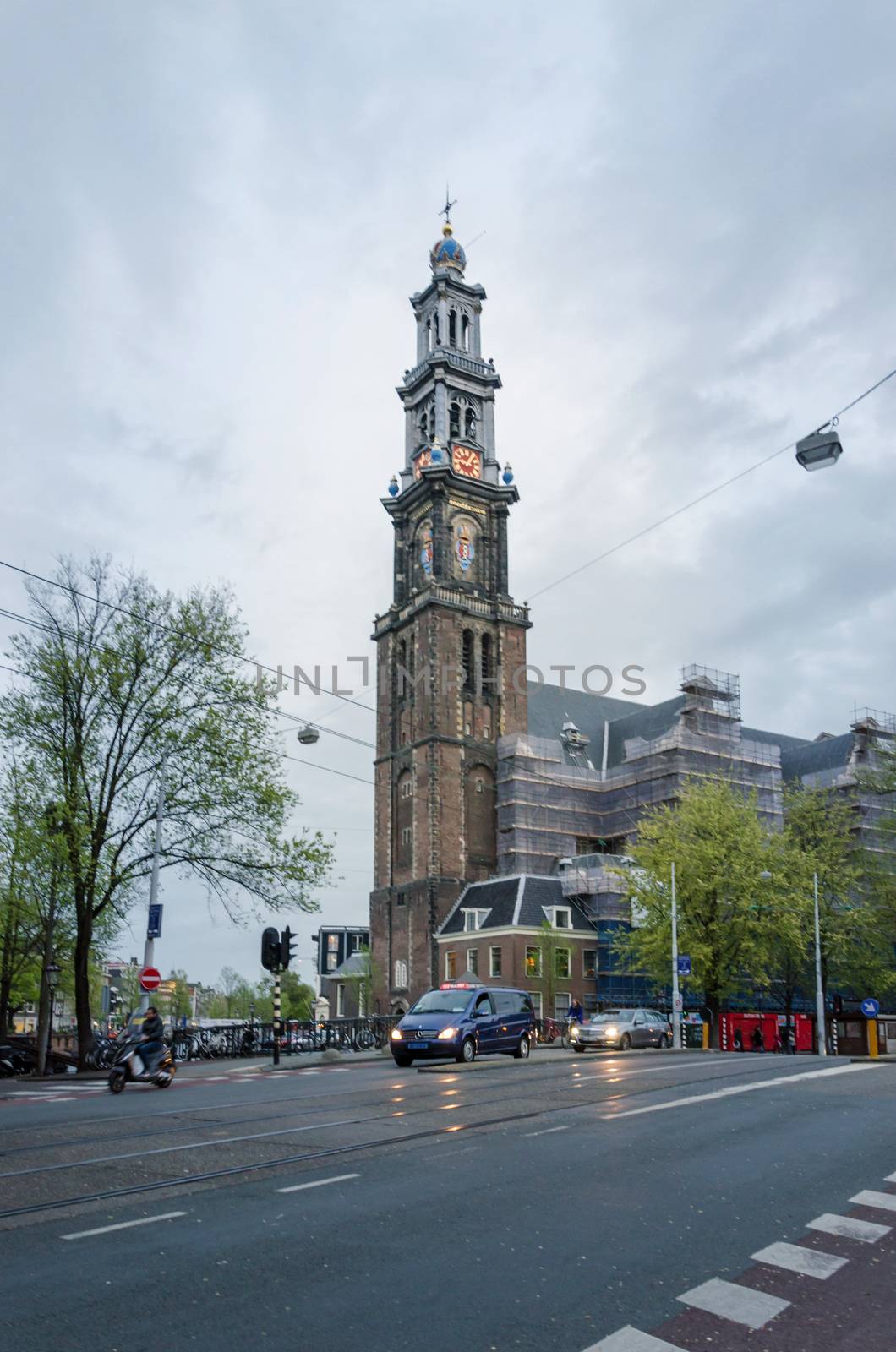 Amsterdam, Netherlands - May 6, 2015: People at Westerkerk at Rijksmuseum, Amsterdam. by siraanamwong