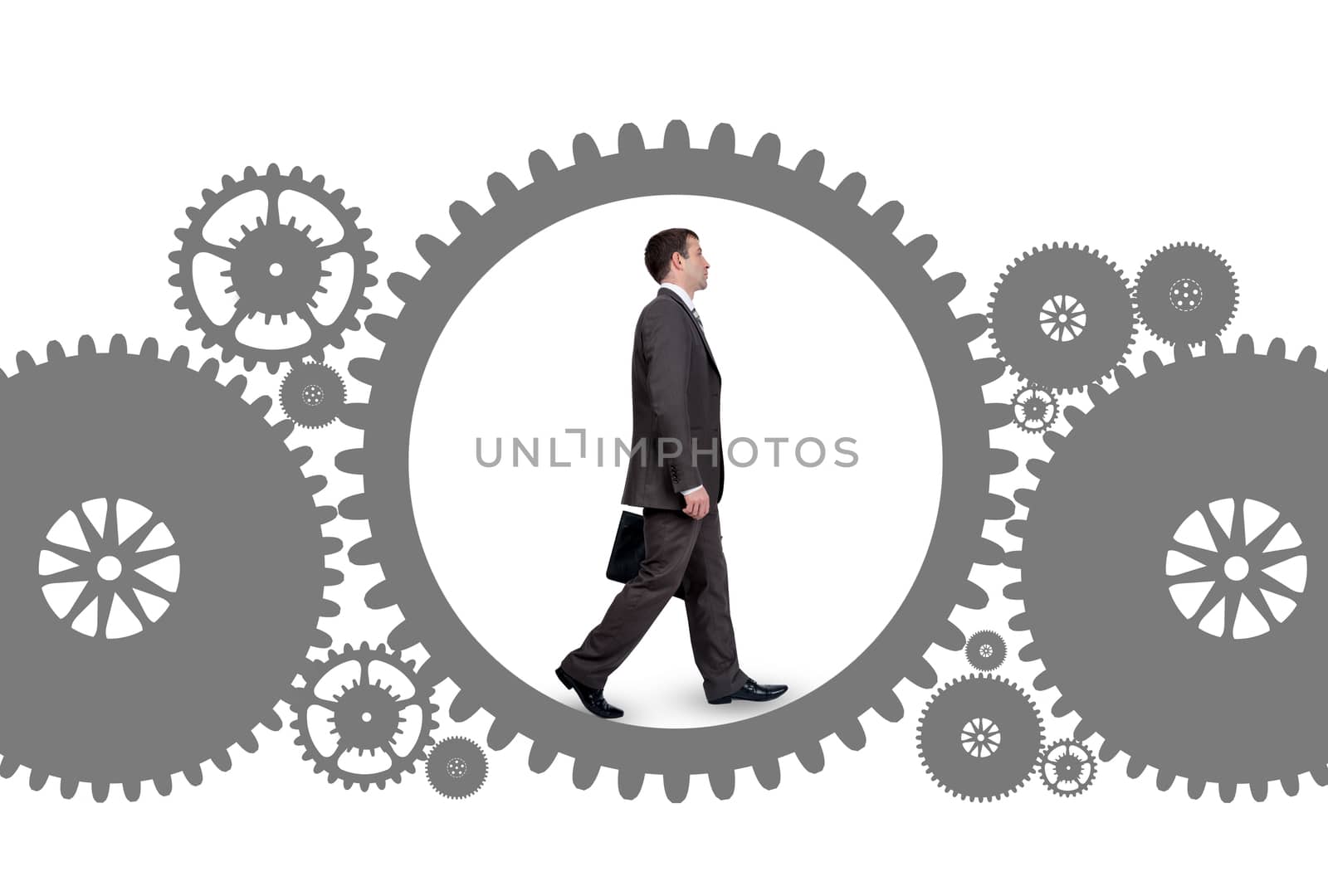 Businessman walking inside gear isolated on white background, business concept
