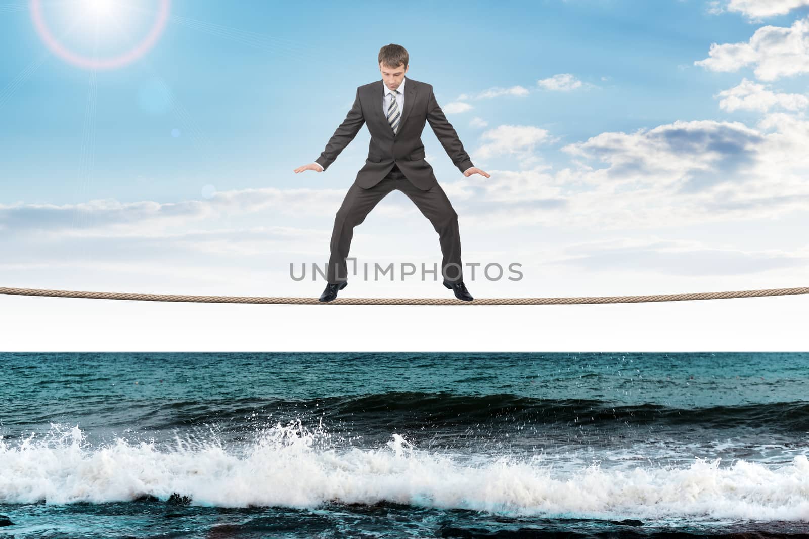 Businessman on rope by cherezoff
