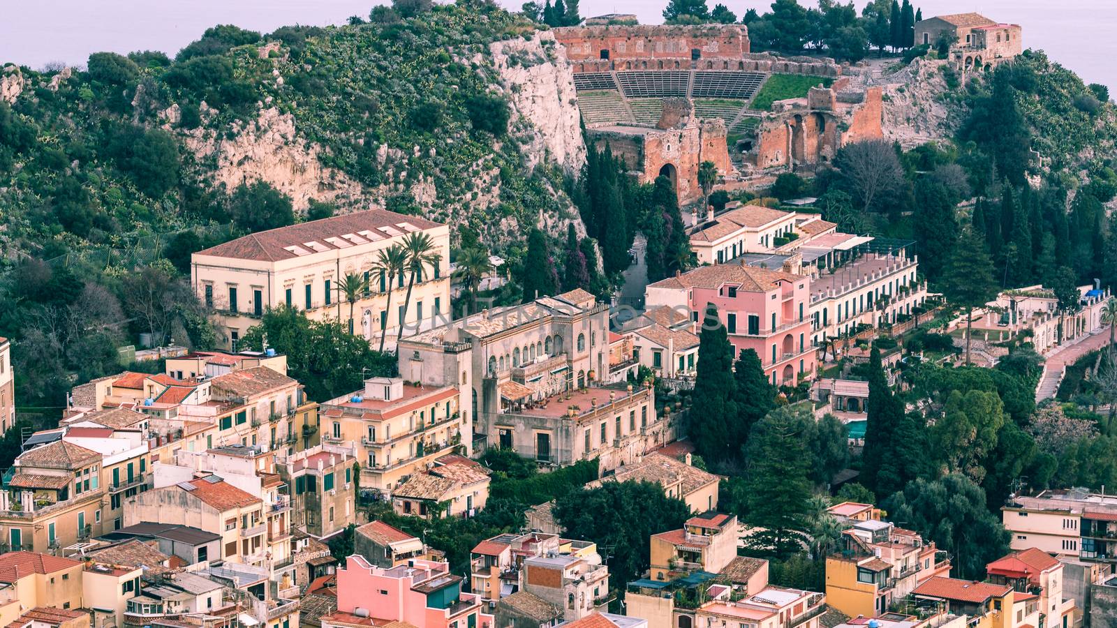 Aerial view of the Taormina city, with the ancient greek amphitheatre, Sicily island, Italy.