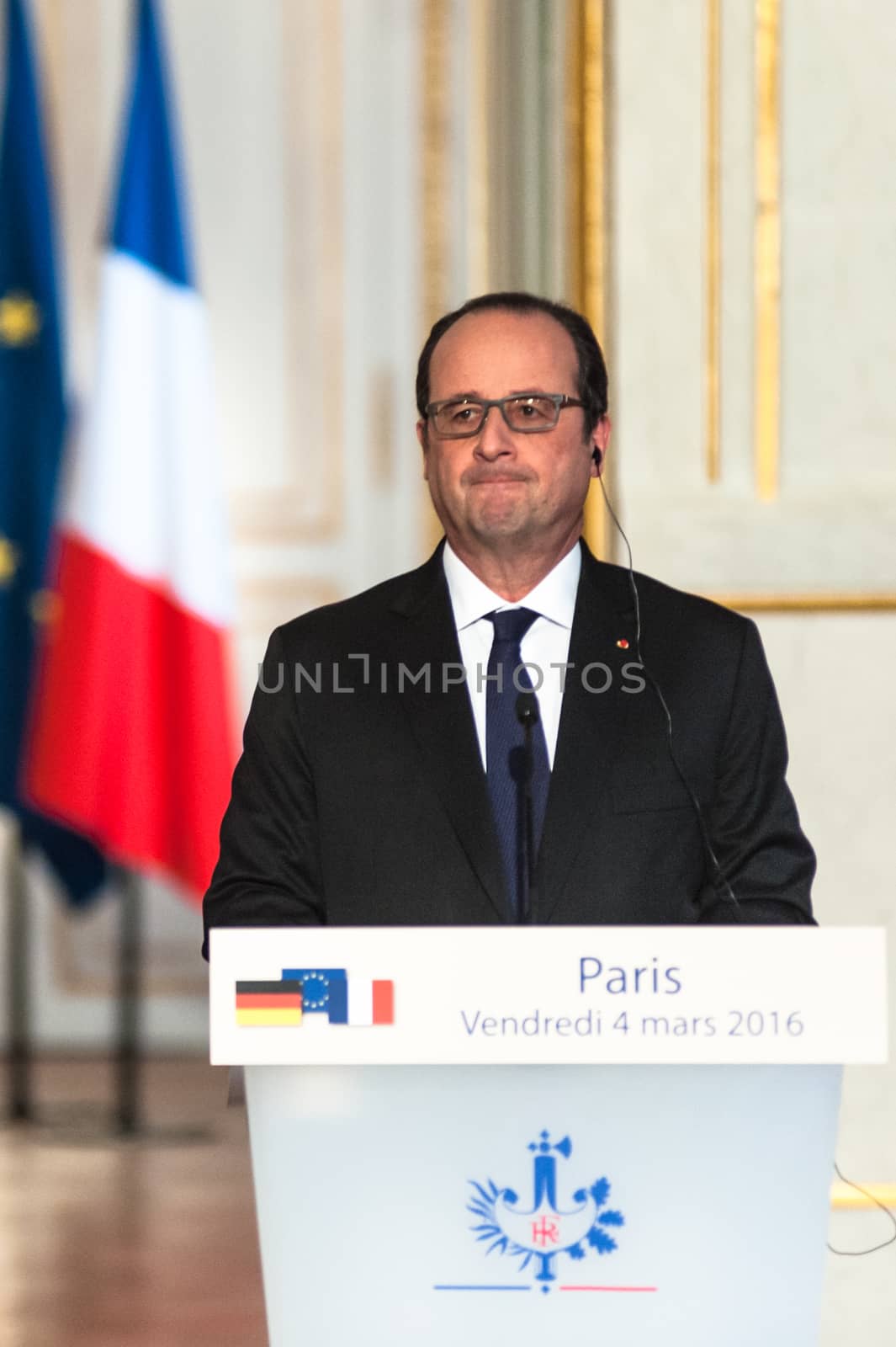 FRANCE, Paris: French President Francois Hollande (R) and German Chancellor Angela Merkel deliver a joint press conference at the Elysee Presidential Palace, in Paris, on March 4, 2016. 