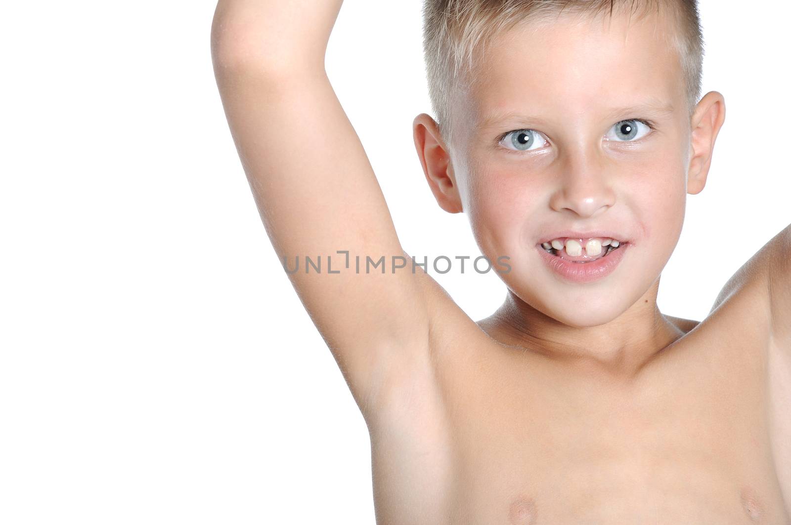 photo of young muscular posing naked torso holding raised hands and arms up isolated over white background