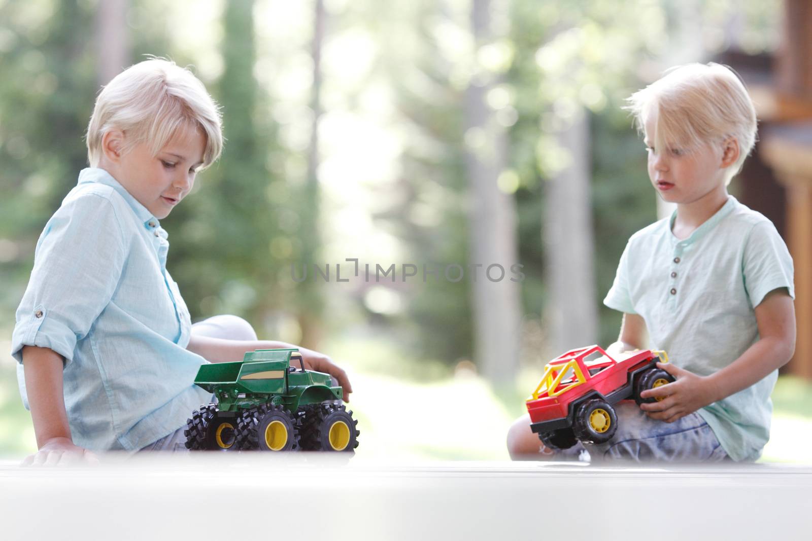 Kids playing with cars by ALotOfPeople