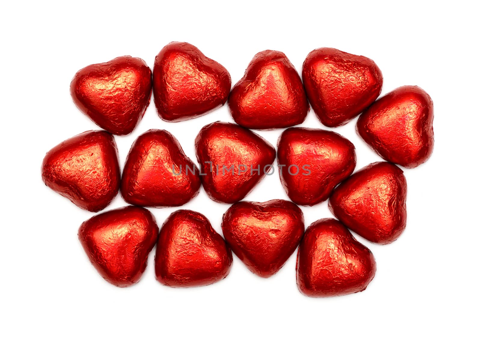 Red chocolate hearts isolated on white