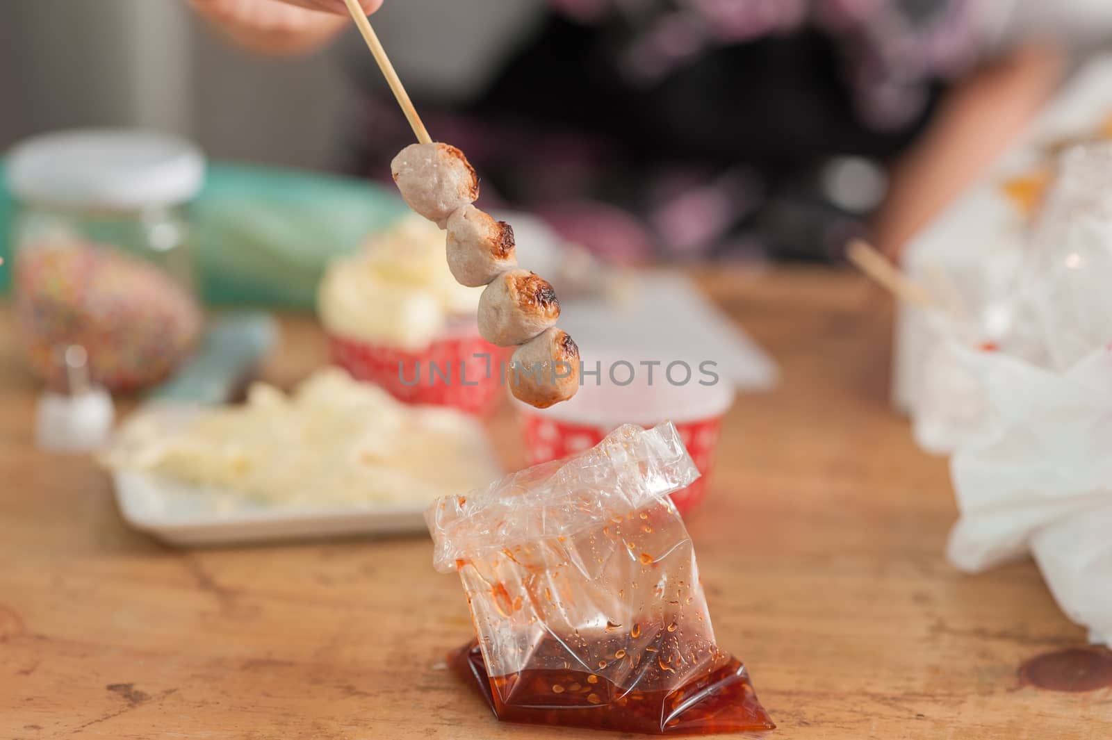 Thai style grilled meat ball with spicy dressing. Thai street food