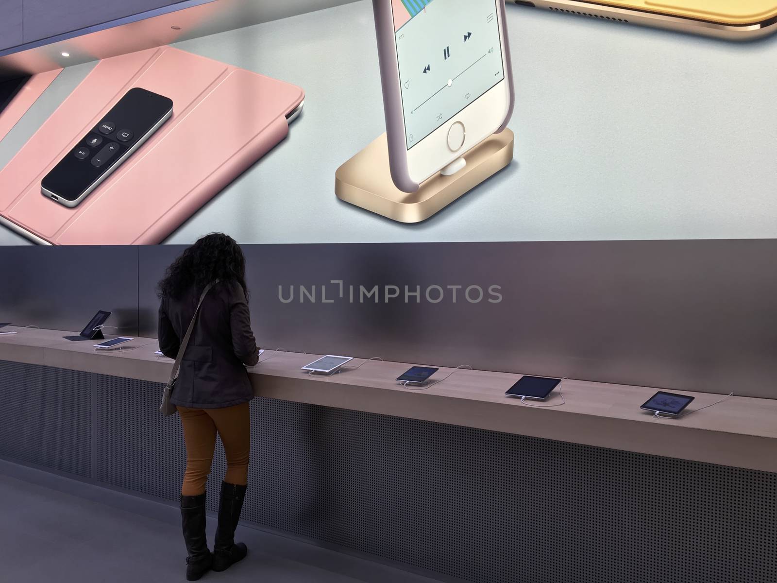 Shopping inside Apple Store in New York City,  UNITED STATES AMERICA - FEB 23 2016: New Apple products , iPad Pro displayed for use in New York, USA