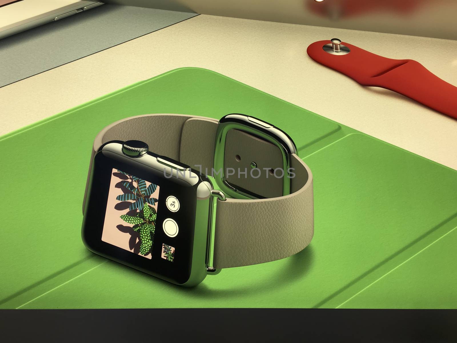 Shopping inside Apple Store in New York City,  UNITED STATES AMERICA - FEB 23 2016: New Apple Watch smartwatch displaying on a poster inside Apple Store, New York, USA