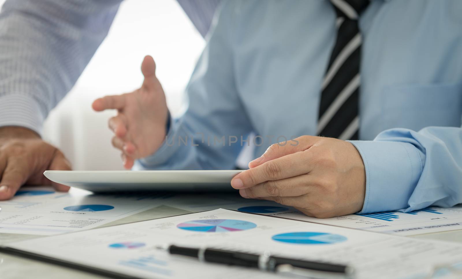Businessman analyzing financial data of the company.