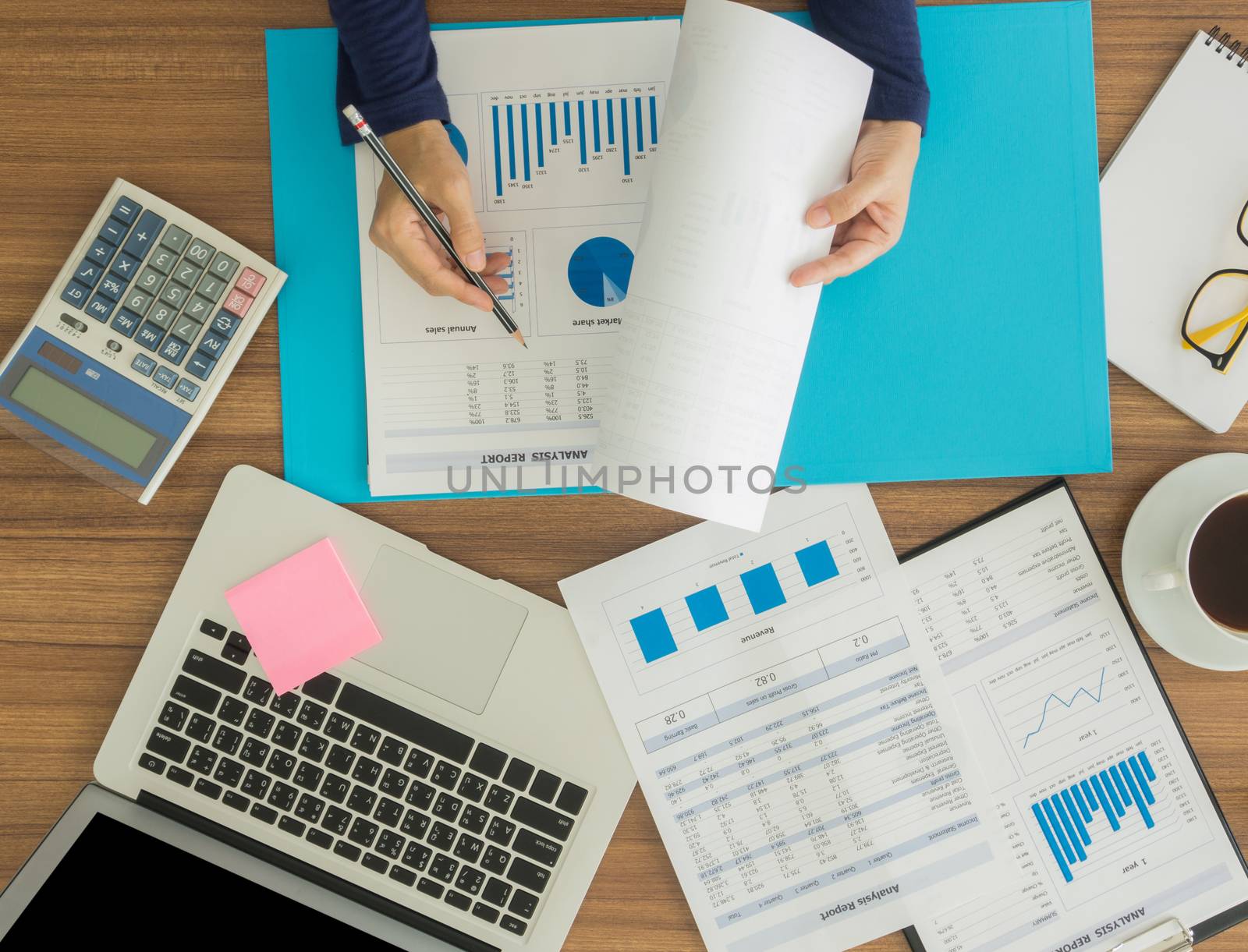 human are working to analyze the data for the company to plan. above view.