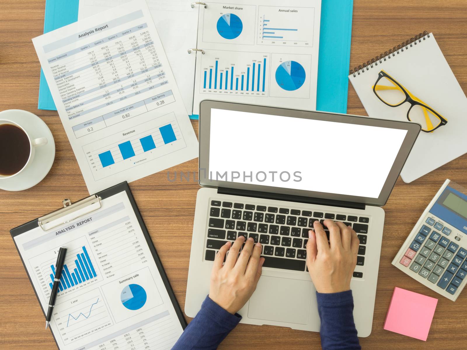 businesswomen hand working with digital laptop computer on wooden desk in office. top view