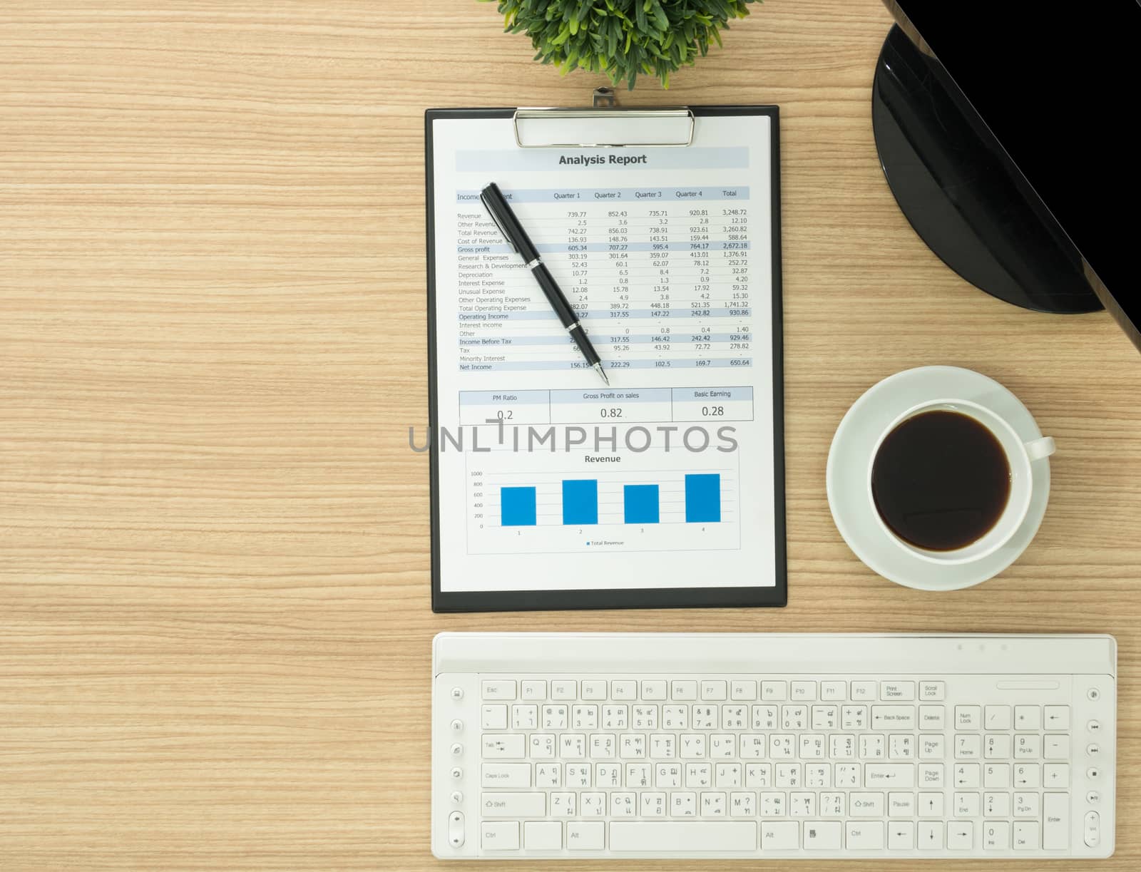 Office table with  computer and report. above view and free space for text.