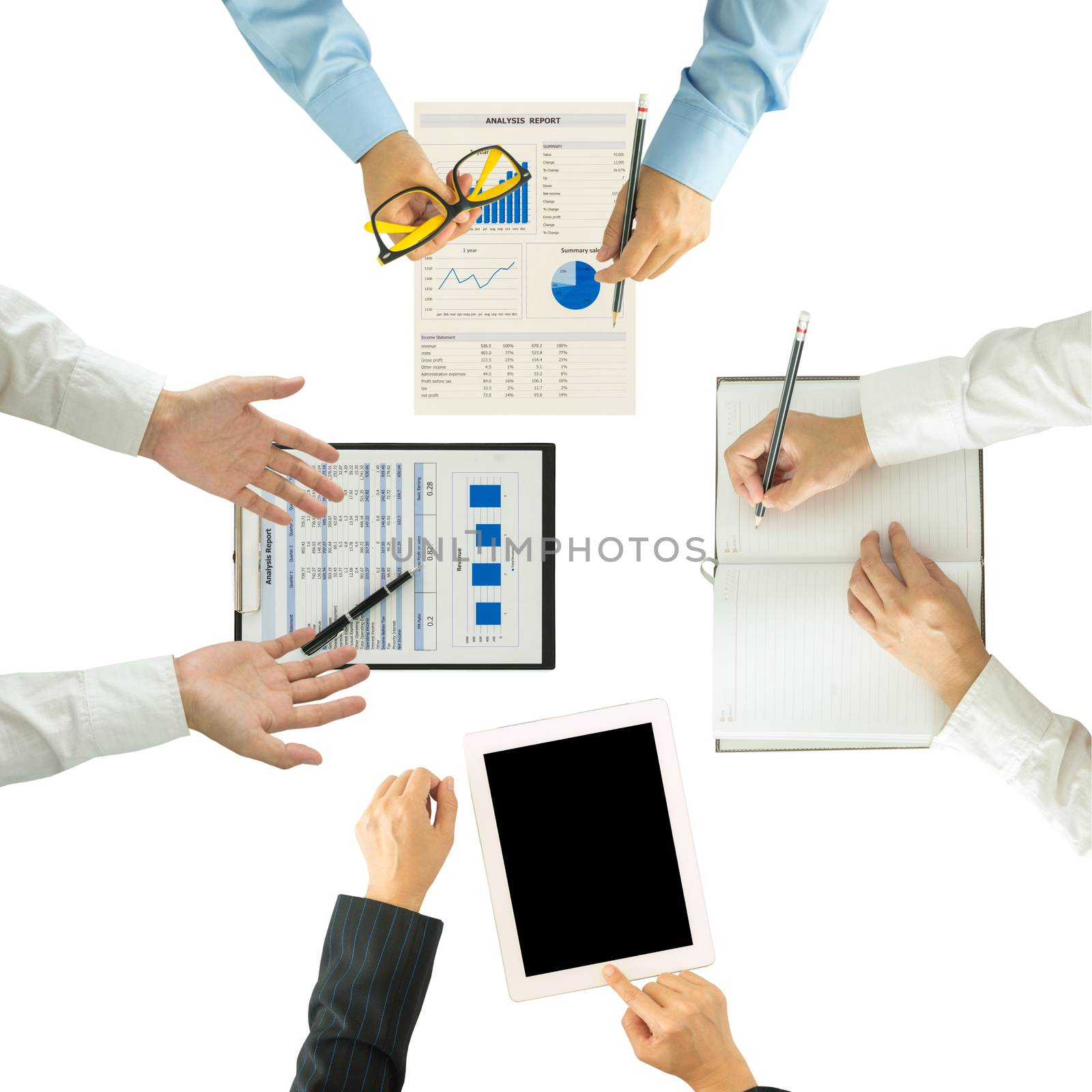 Top view of group of business people working on an office desk.